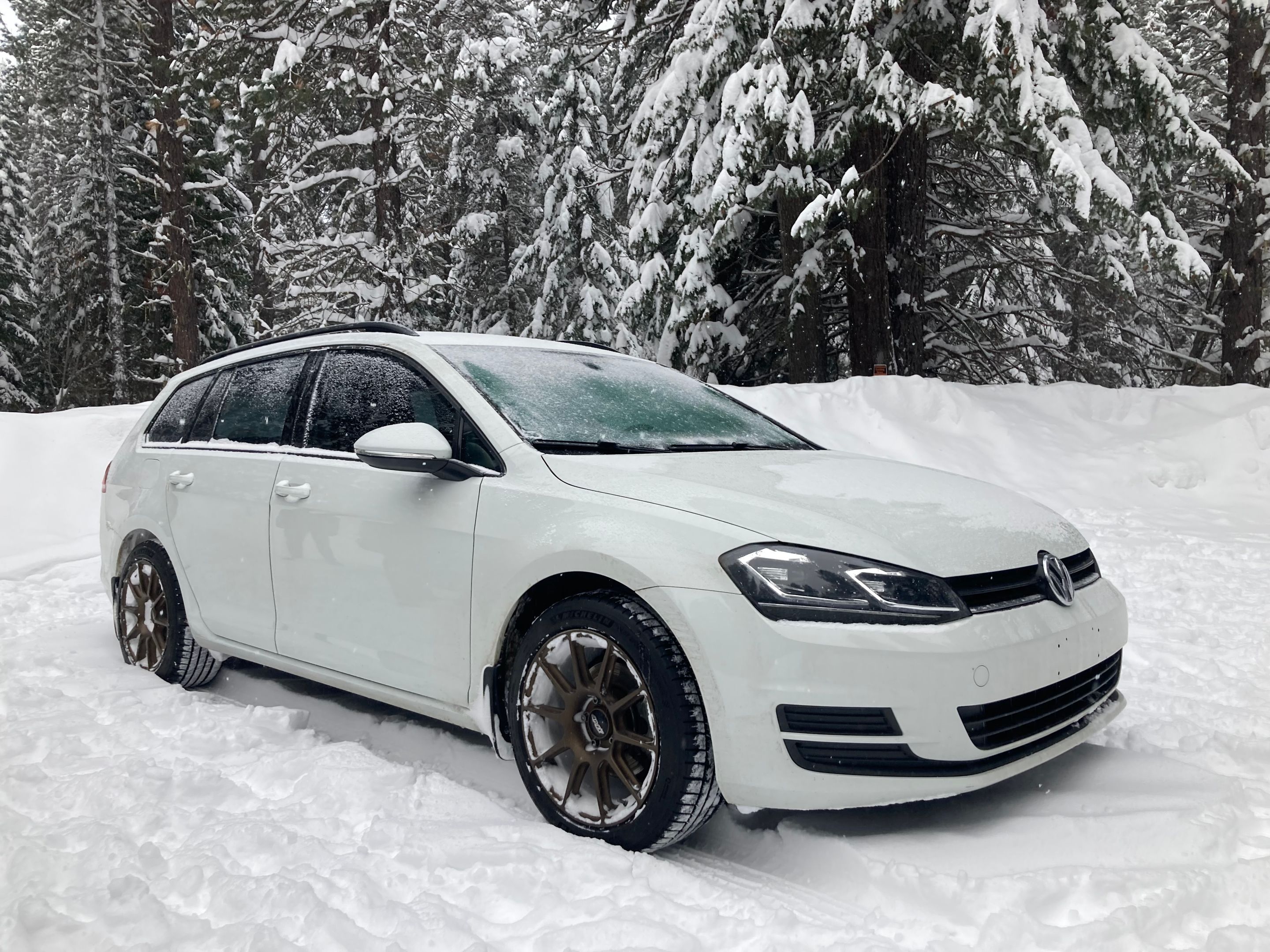 White VW MK7 Alltrack/SportWagen Golf SportWagen with 17" SM-10 Apex wheels in Satin Bronze