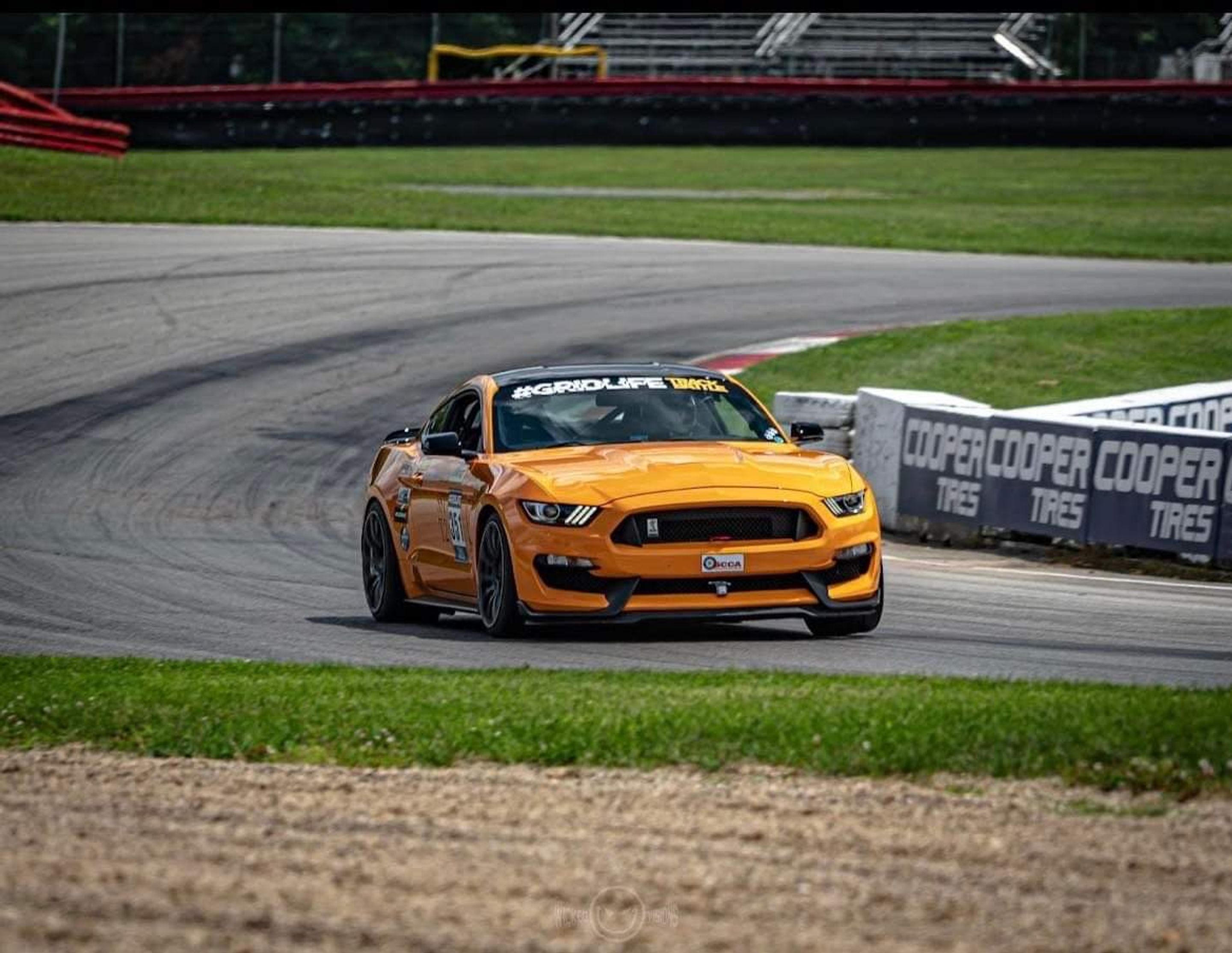 Orange Ford S550 Mustang GT350 with 19" SM-10 Apex wheels in Anthracite