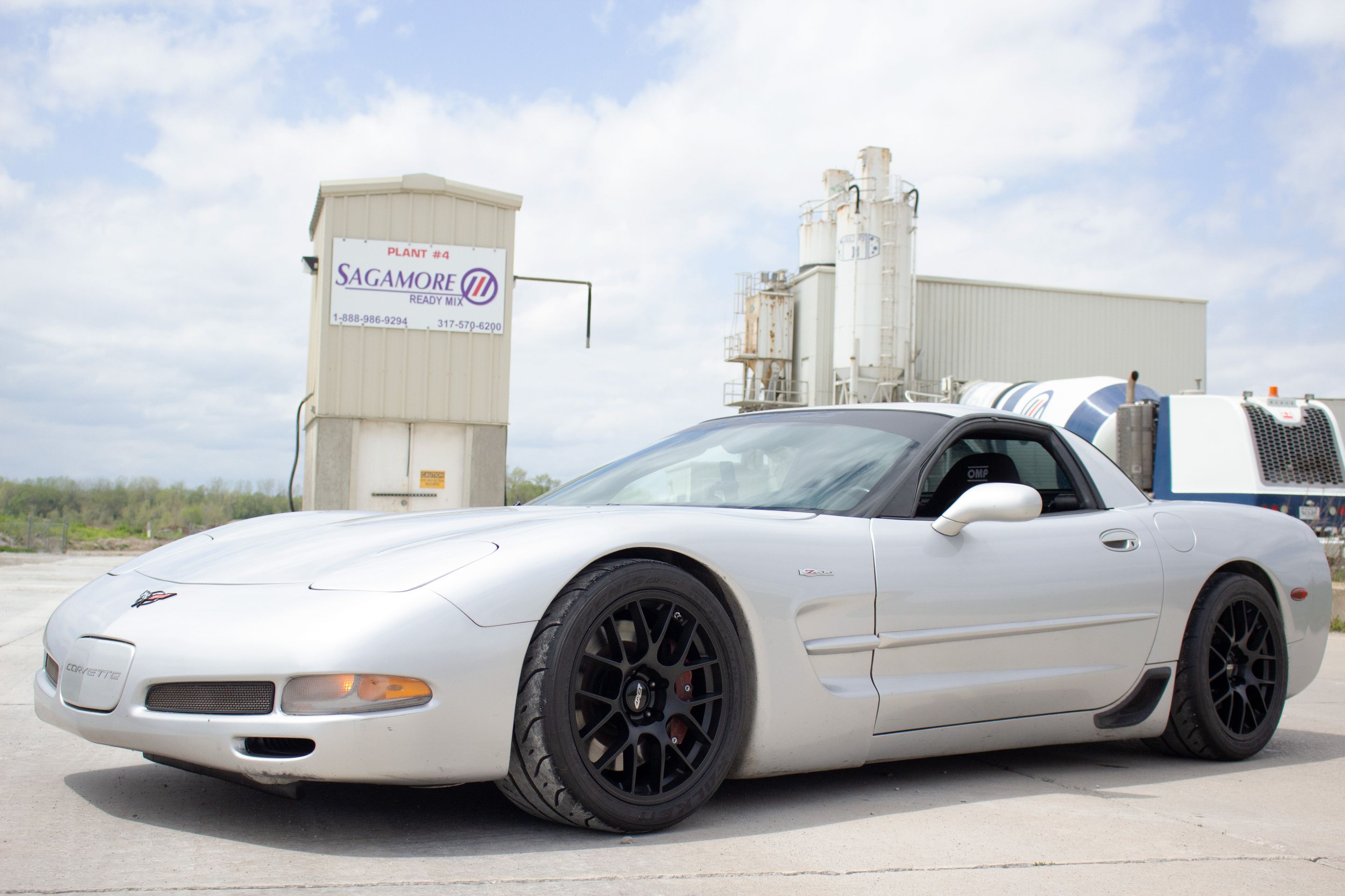 Silver Chevrolet C5 Corvette Z06 with 18" EC-7 Apex wheels in Satin Black