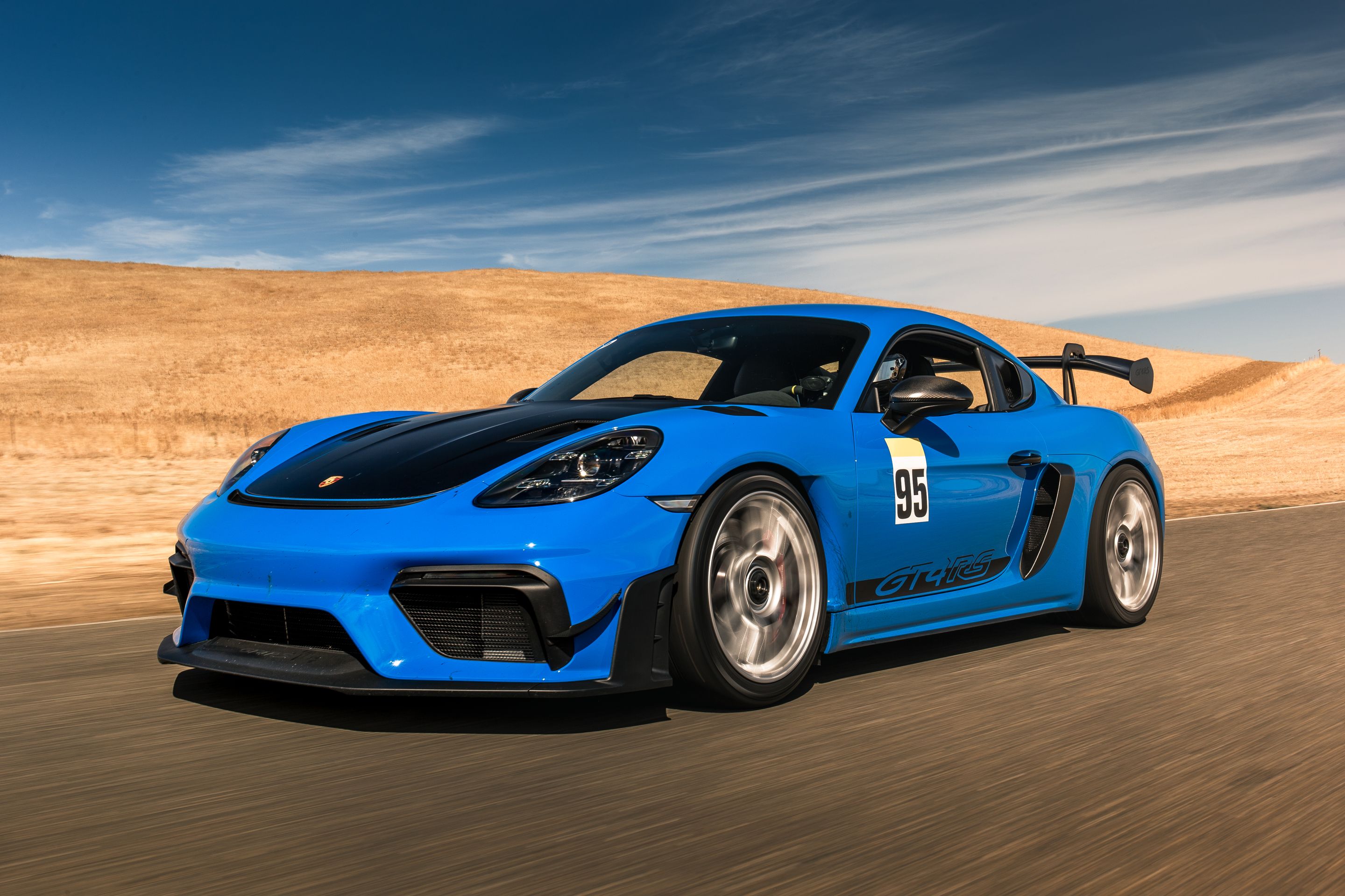 Blue Porsche 718 Cayman GT4 RS with 19" EC-7RS Apex wheels in Race Silver