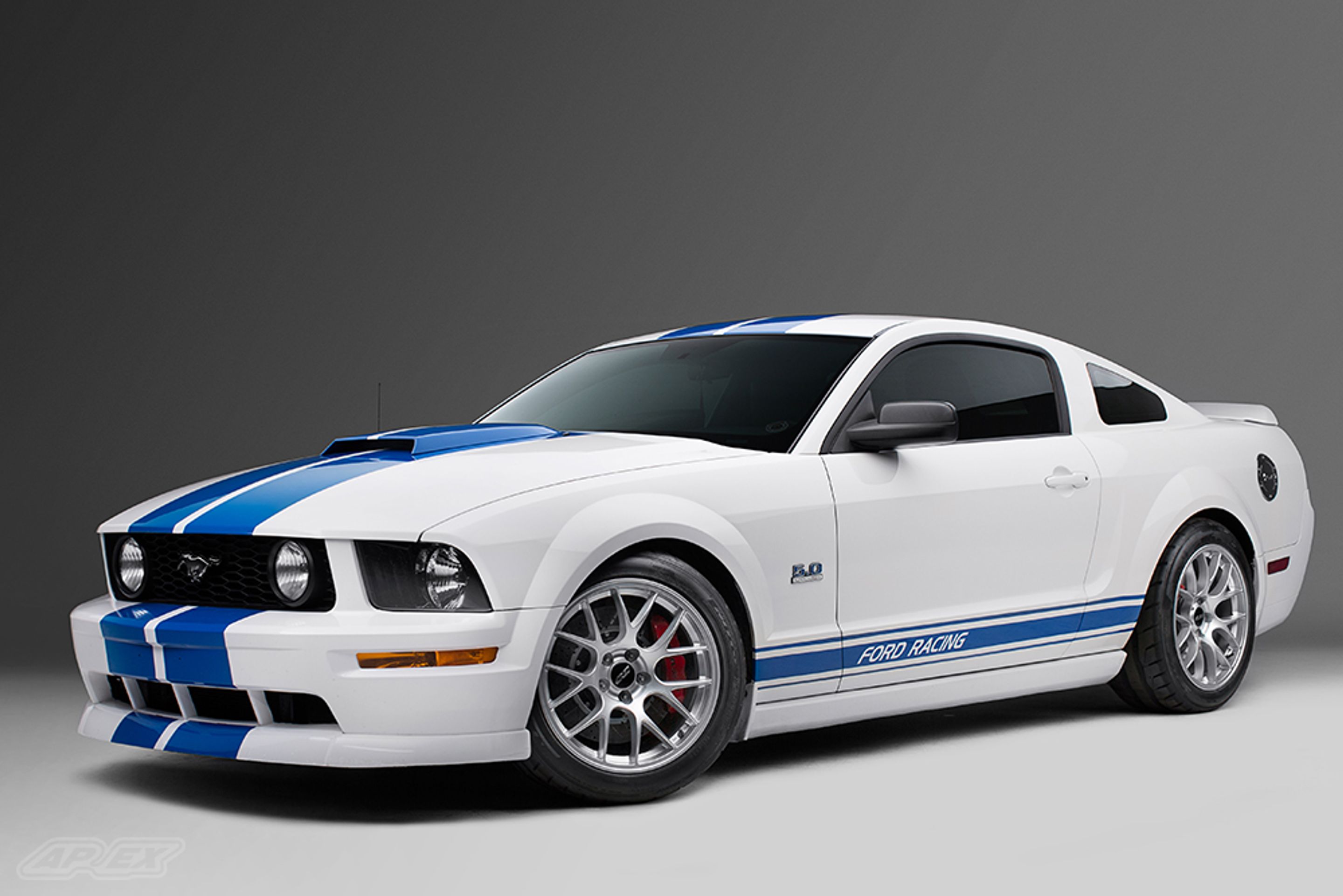 White Ford S197 Mustang GT with 18" EC-7 Apex wheels in Race Silver