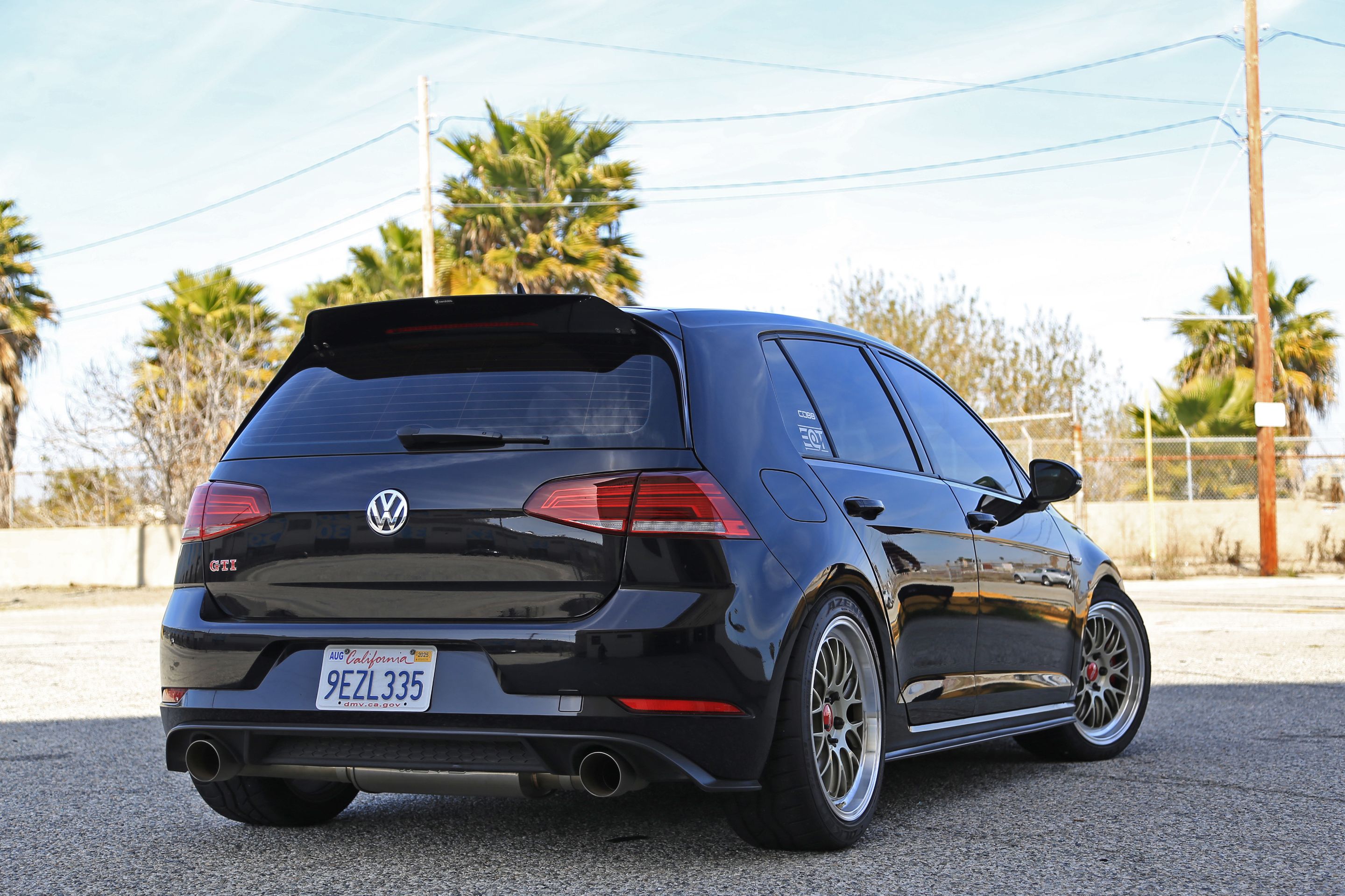 Black VW MK7 GTI with 18" ML-10RT Apex wheels in Machined Lip Gloss Motorsport Gold
