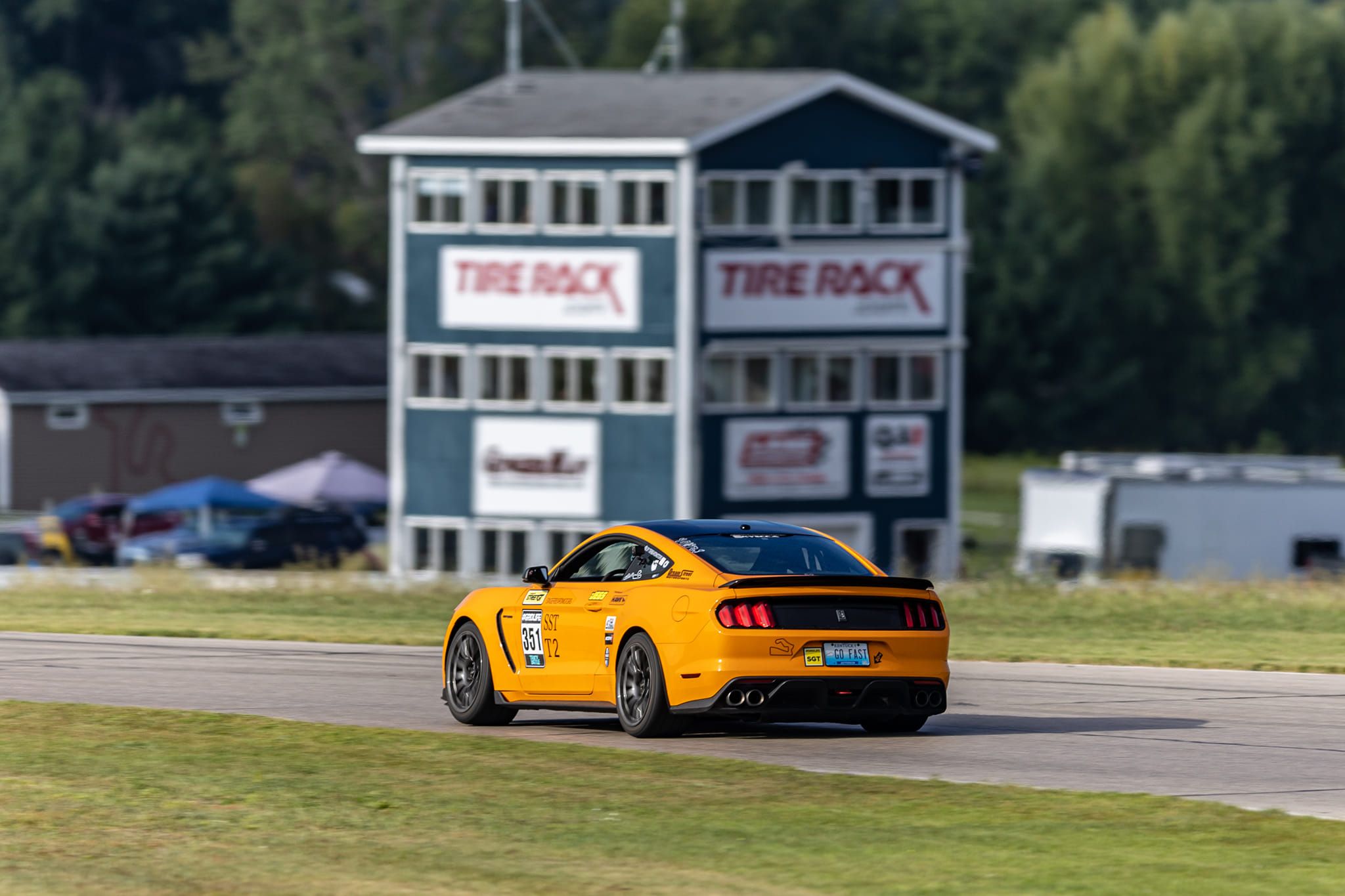 Orange Ford S550 Mustang GT350 with 19" SM-10 Apex wheels in Anthracite