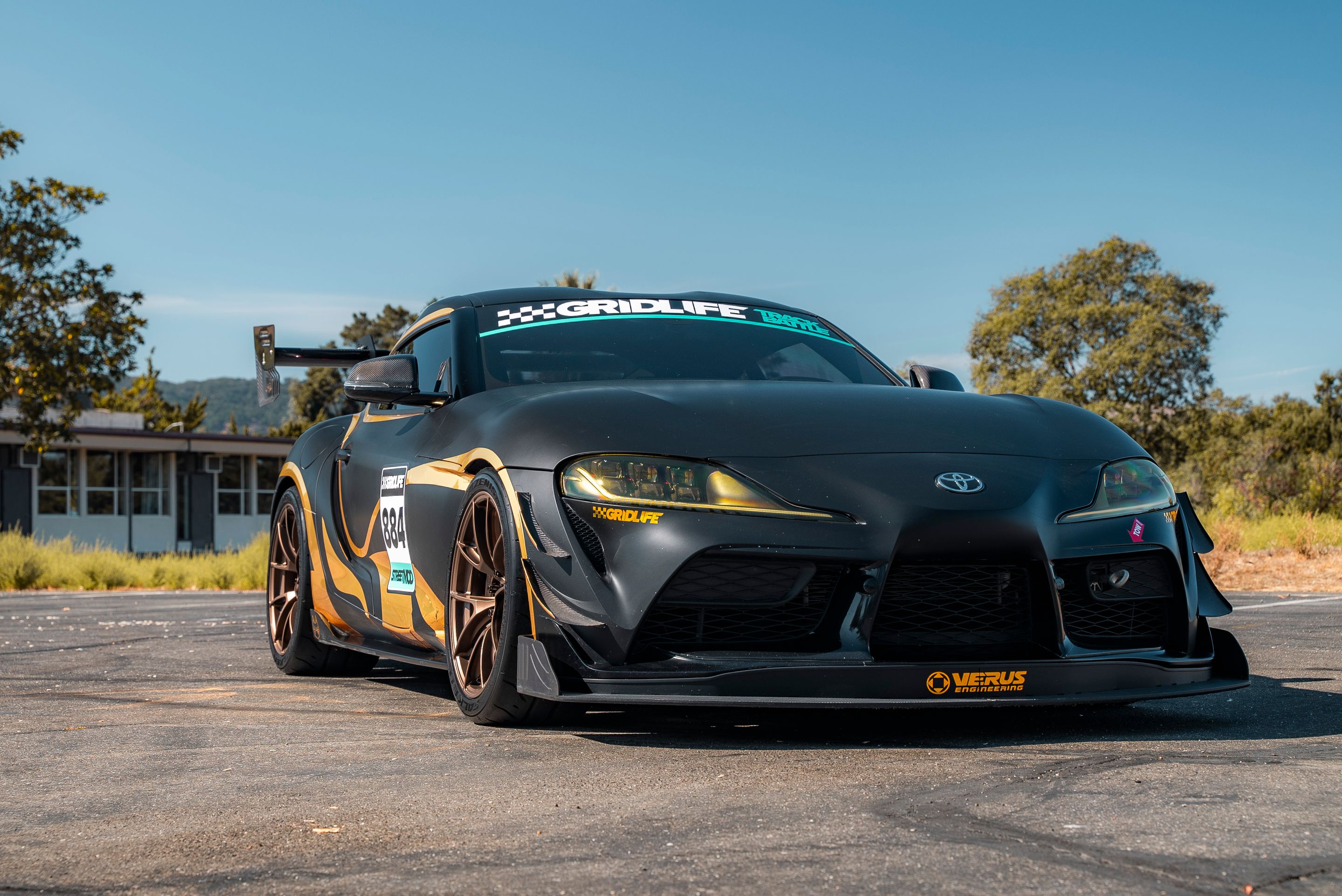 Grey Toyota GR Supra with 19" VS-5RS Apex wheels in Satin Bronze