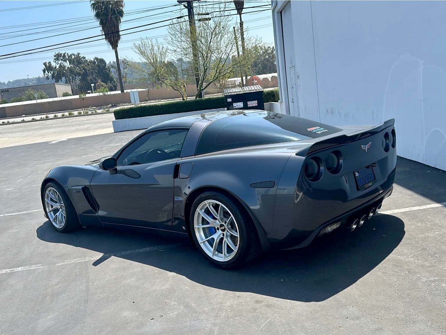 Grey Chevrolet C6 Corvette Z06 with 18" VS-5RS Apex wheels in Brushed Clear