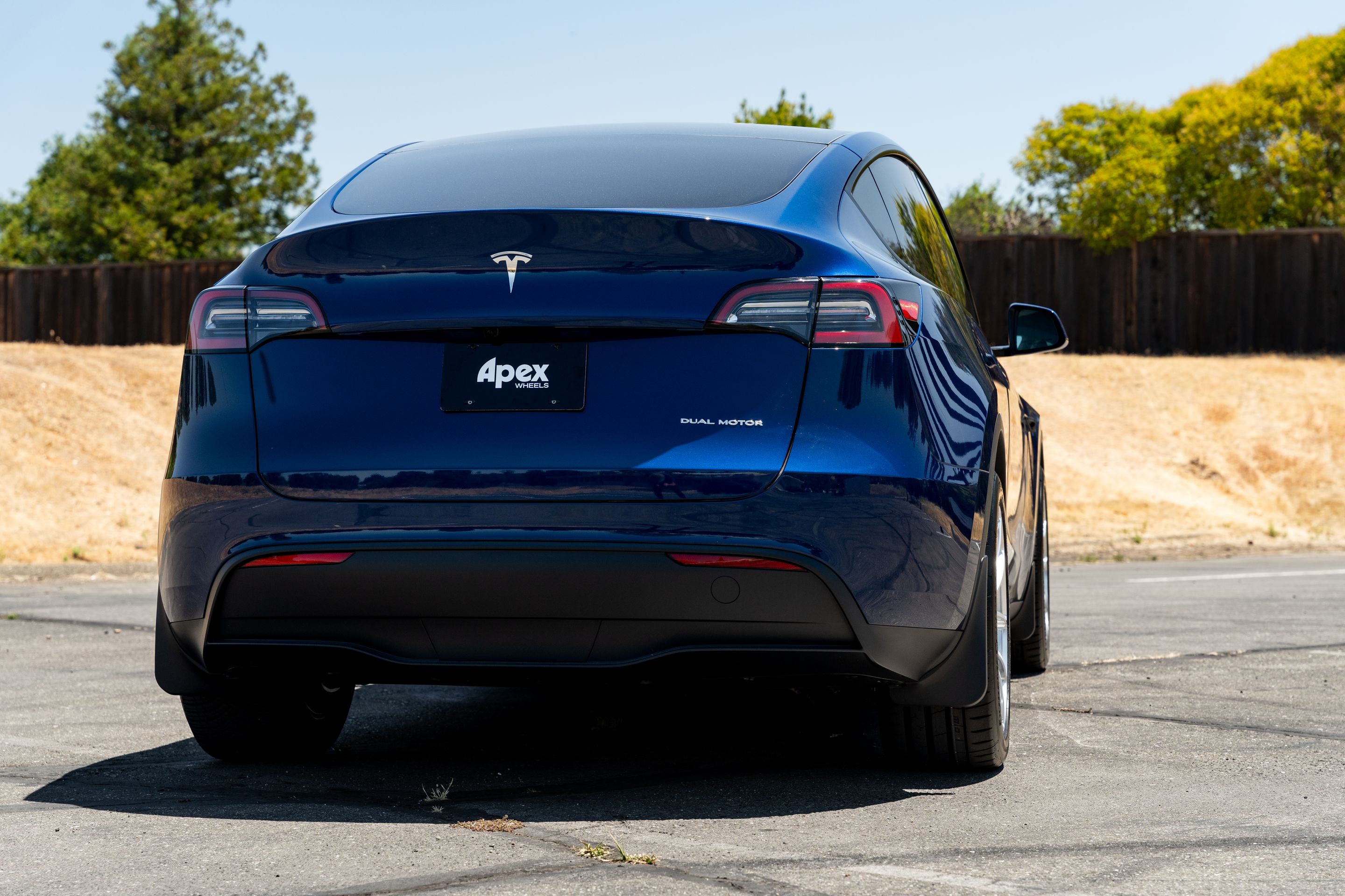 Blue Tesla Model Y RWD/AWD with 20" VS-5RX Apex wheels in Brushed Clear