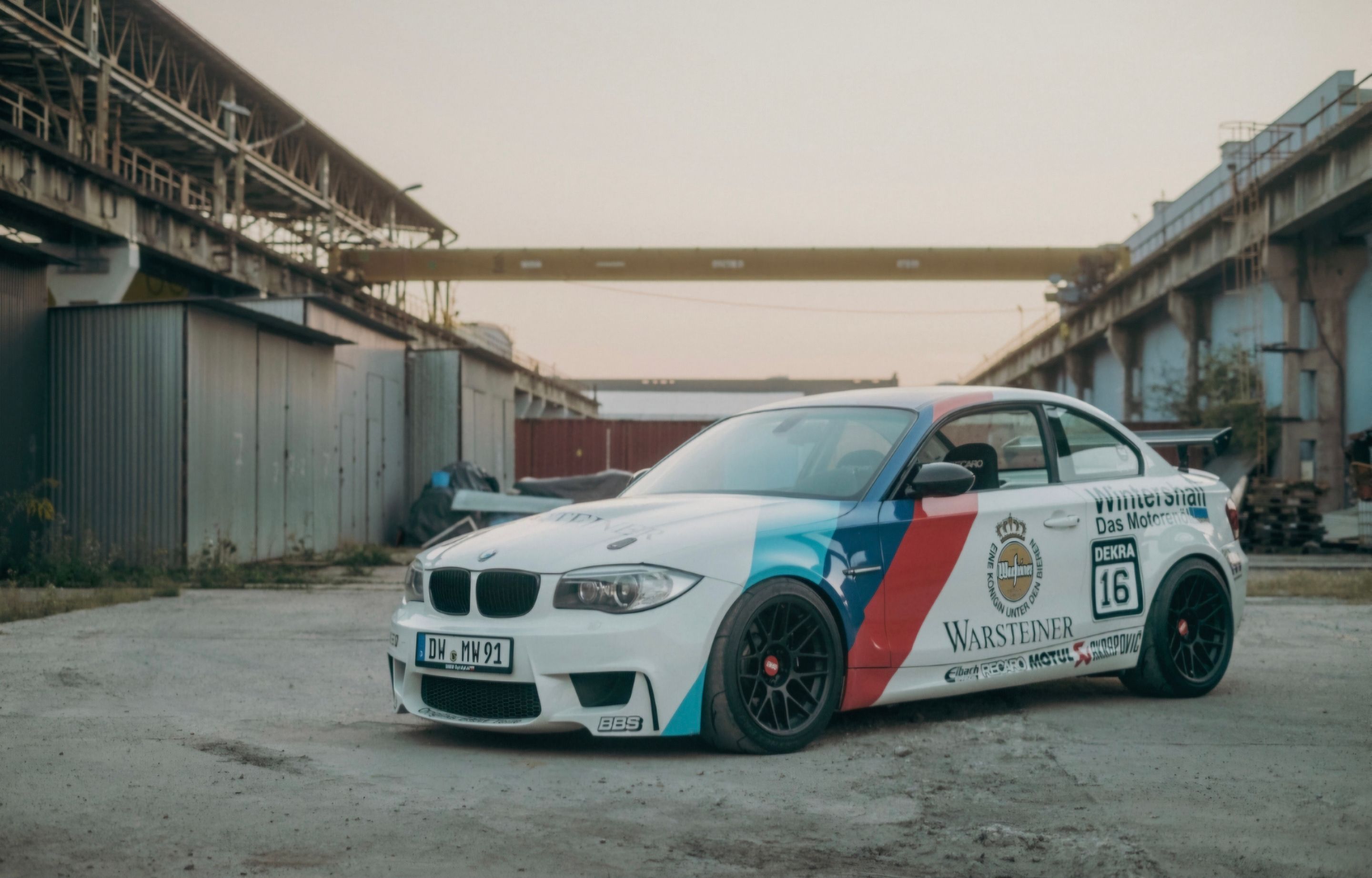 White BMW E82 1M with 18" ARC-8 Apex wheels in Satin Black