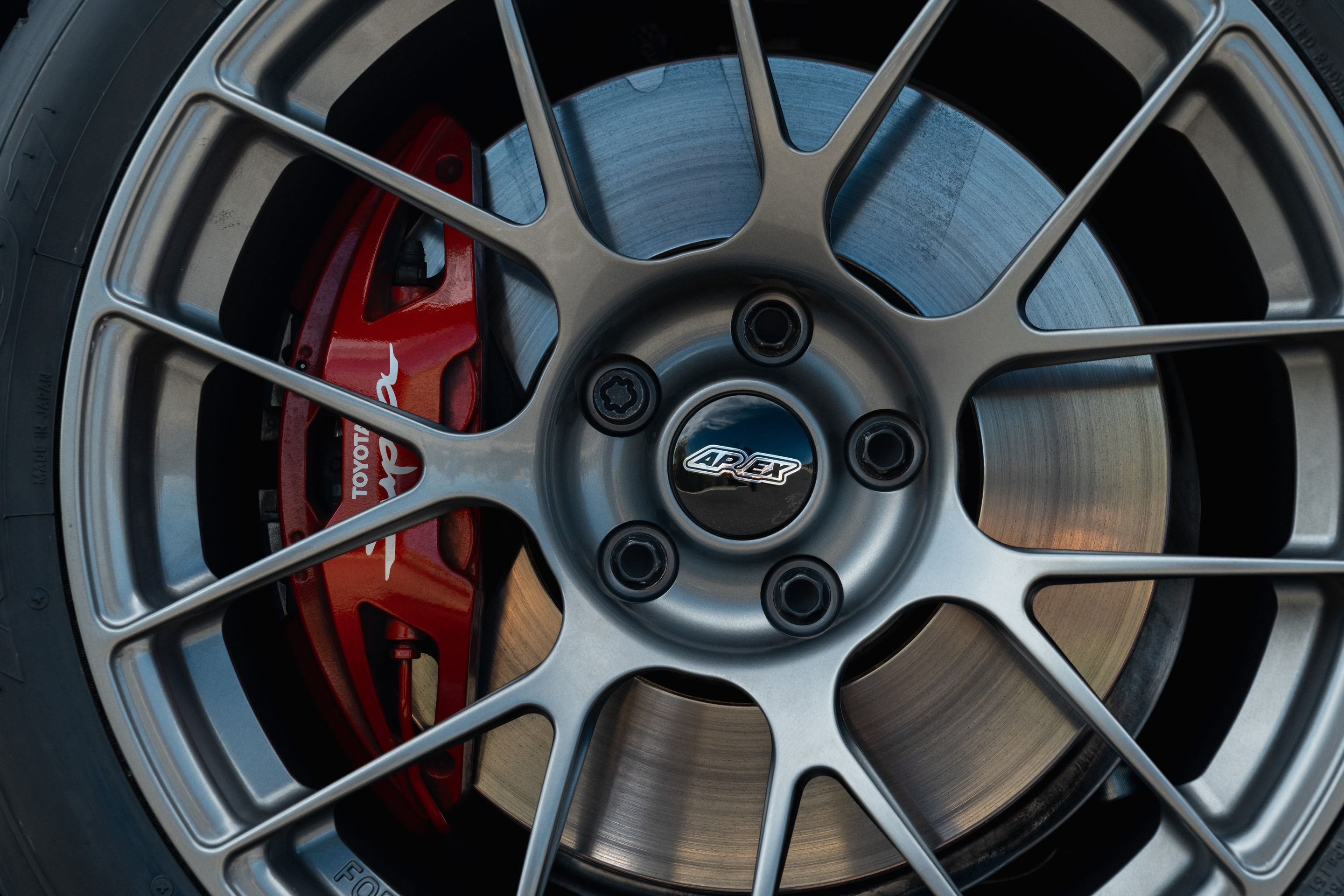 Blue Toyota GR Supra with 18" EC-7RS Apex wheels in Anthracite