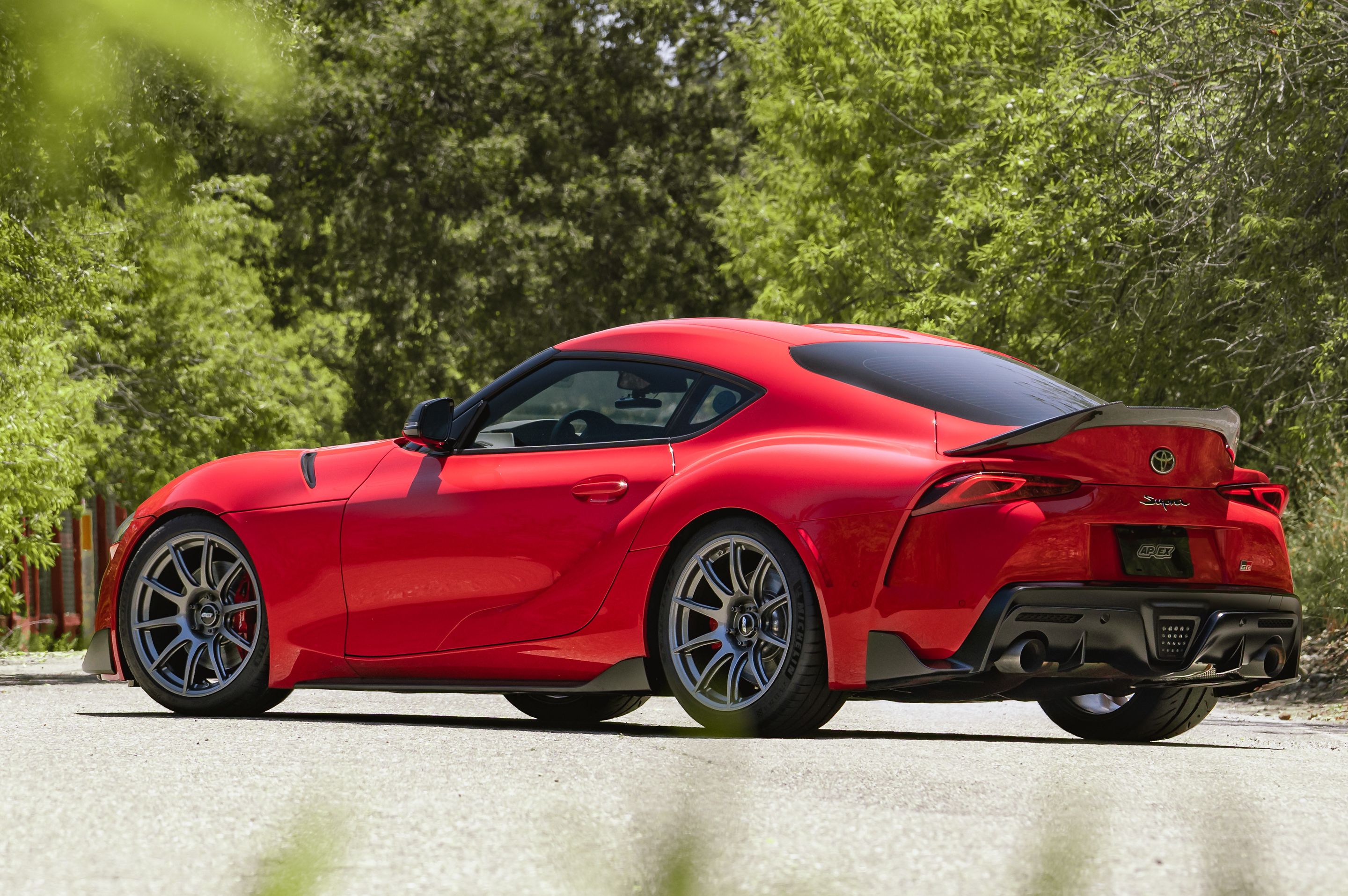 Red Toyota GR Supra with 19" SM-10 Apex wheels in Anthracite