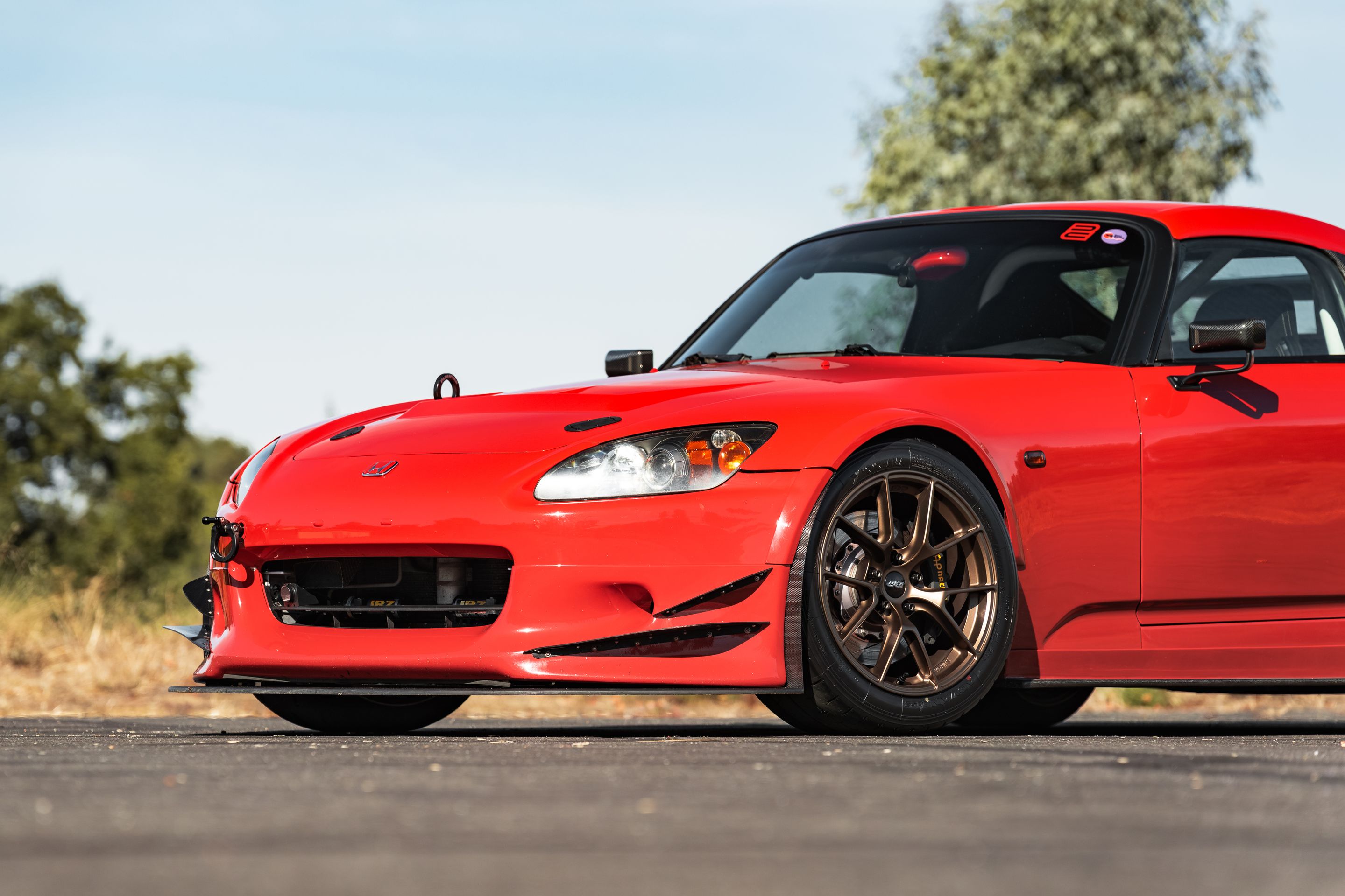 Red Honda S2000 with 17" VS-5RS Apex wheels in Satin Bronze