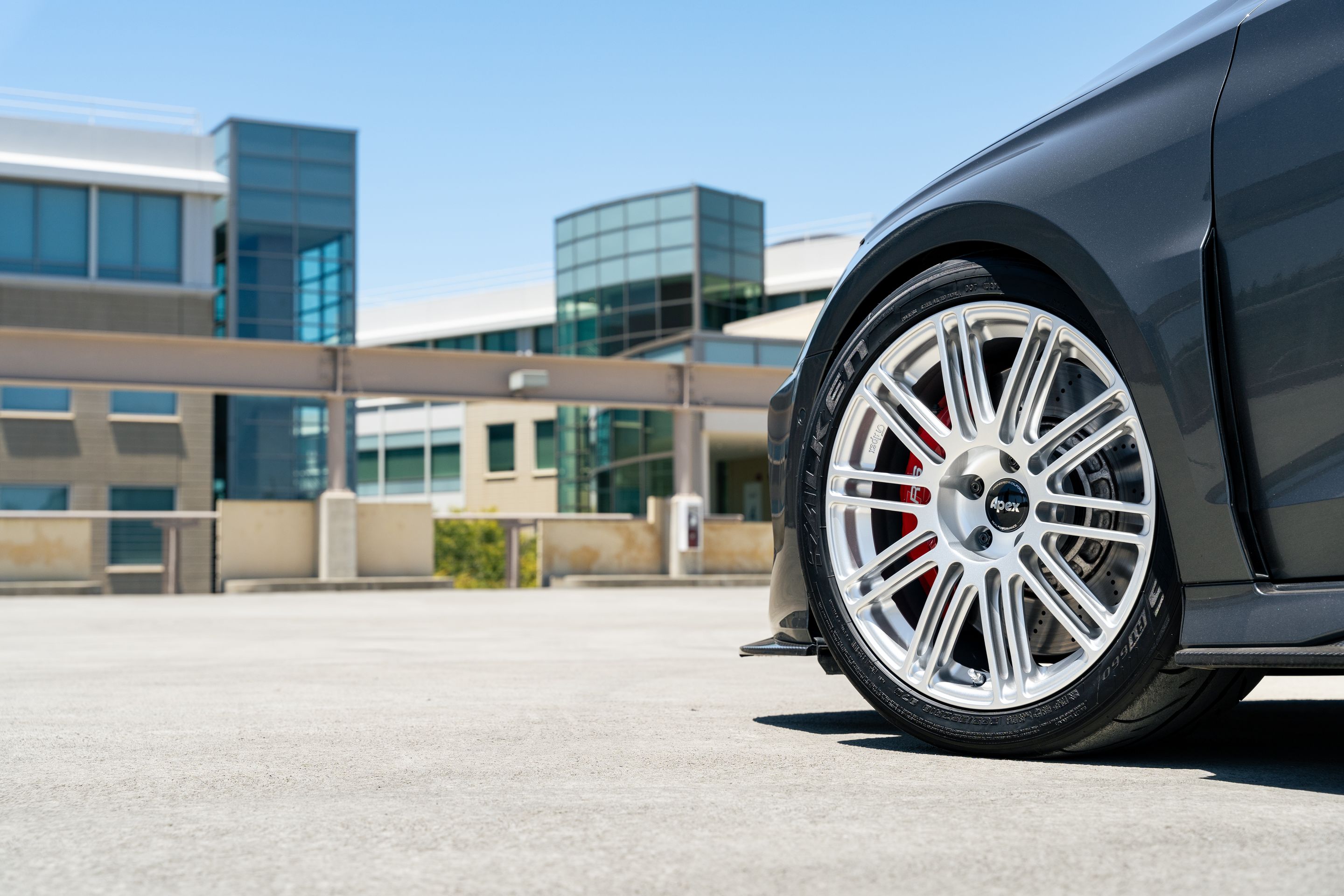 Grey Audi 8Y RS 3 with 18" TC-10RT Apex wheels in Race Silver