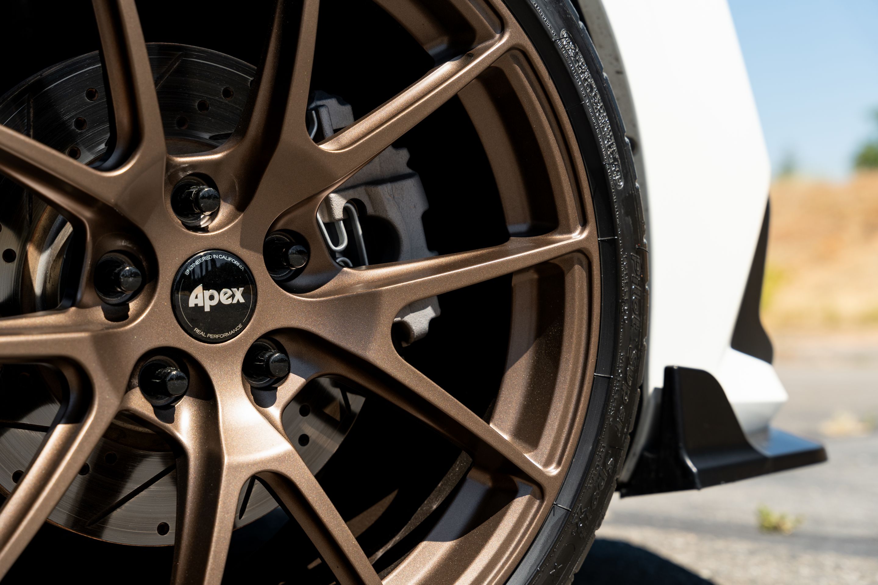 White Honda 11th Gen Civic with 18" VS-5 Apex wheels in Satin Bronze