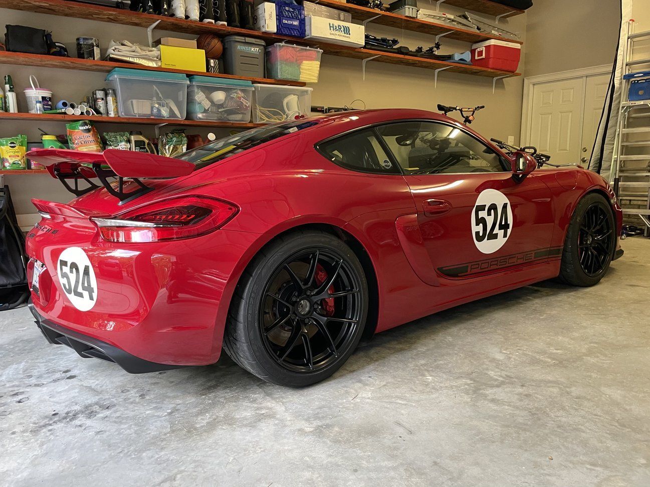 Red Porsche 981 Cayman GT4 with 19" VS-5RS Apex wheels in Satin Black