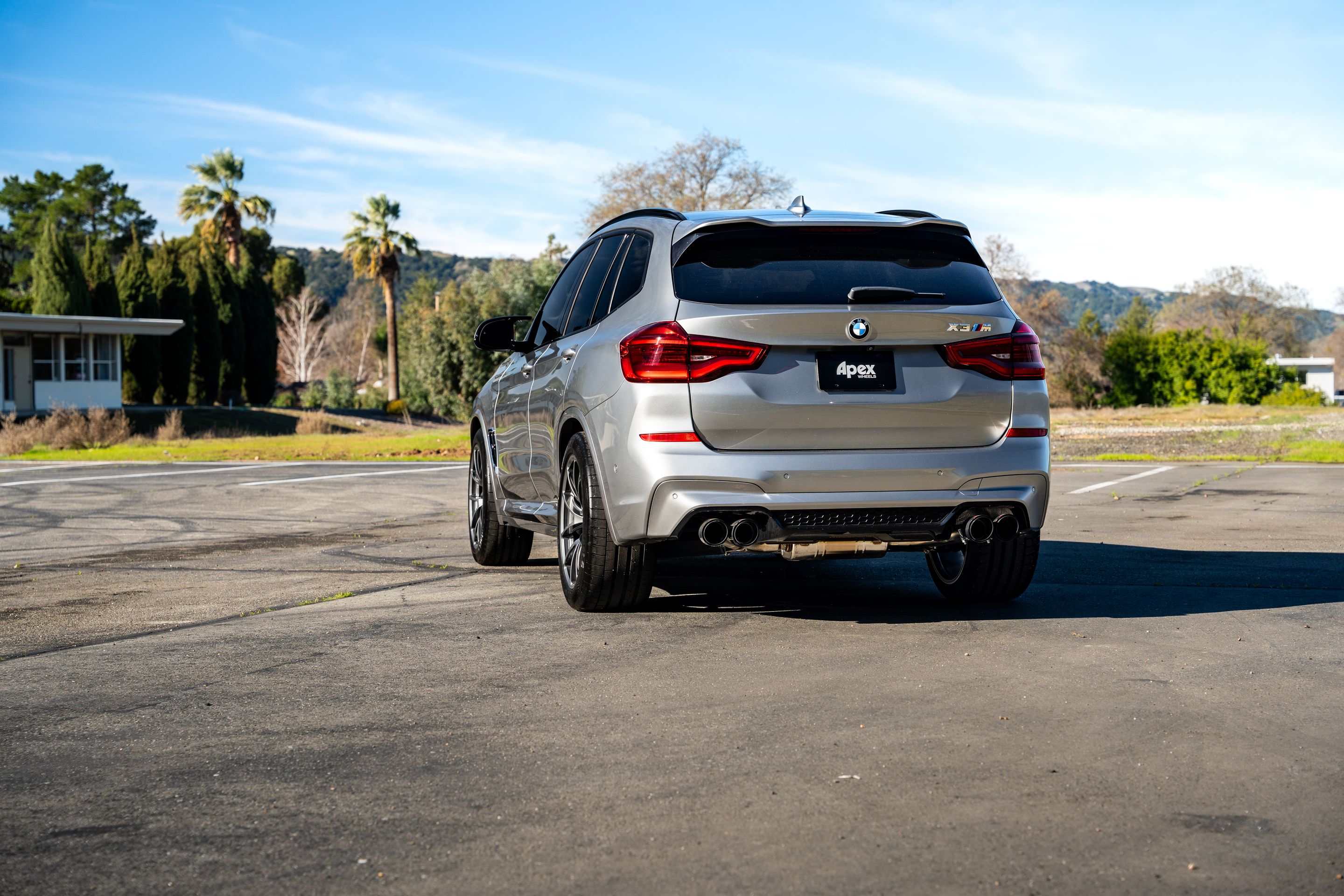 Silver BMW F97 X3M with 20" VS-5RX Apex wheels in Anthracite