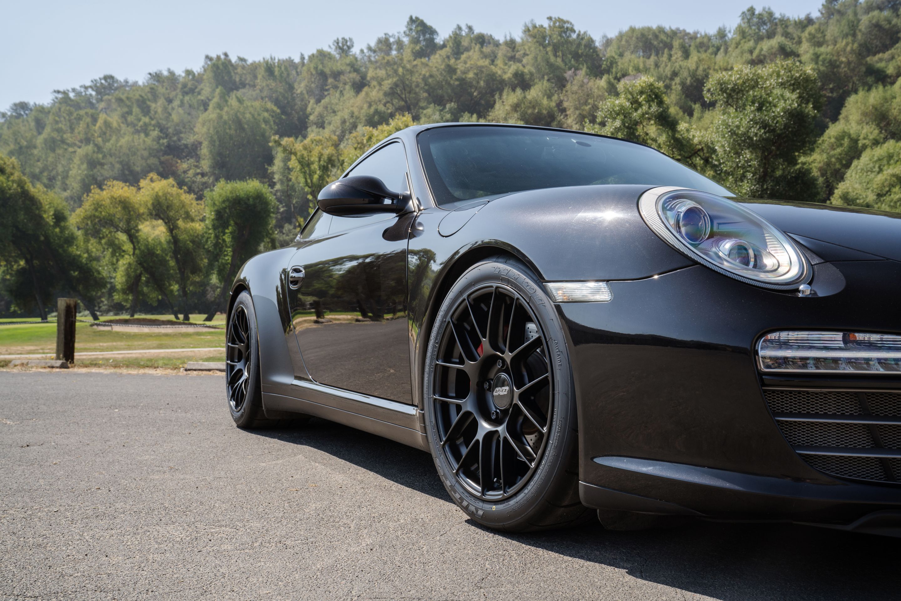 Black Porsche 911 997 Carrera 4S with 18" EC-7RS Apex wheels in Satin Black
