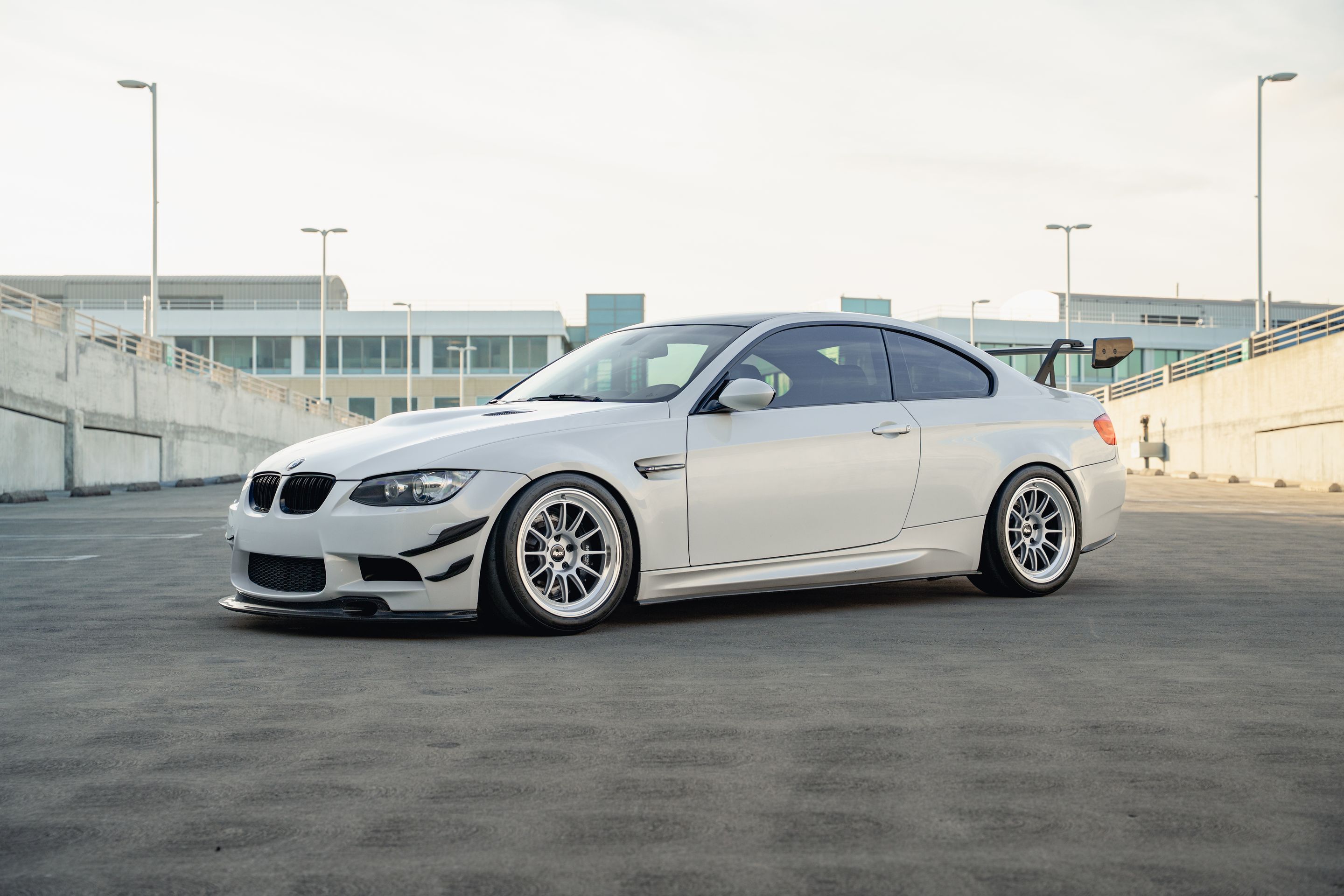 White BMW E92 Coupe M3 with 18" SL-12 Apex wheels in Machined Lip Race Silver