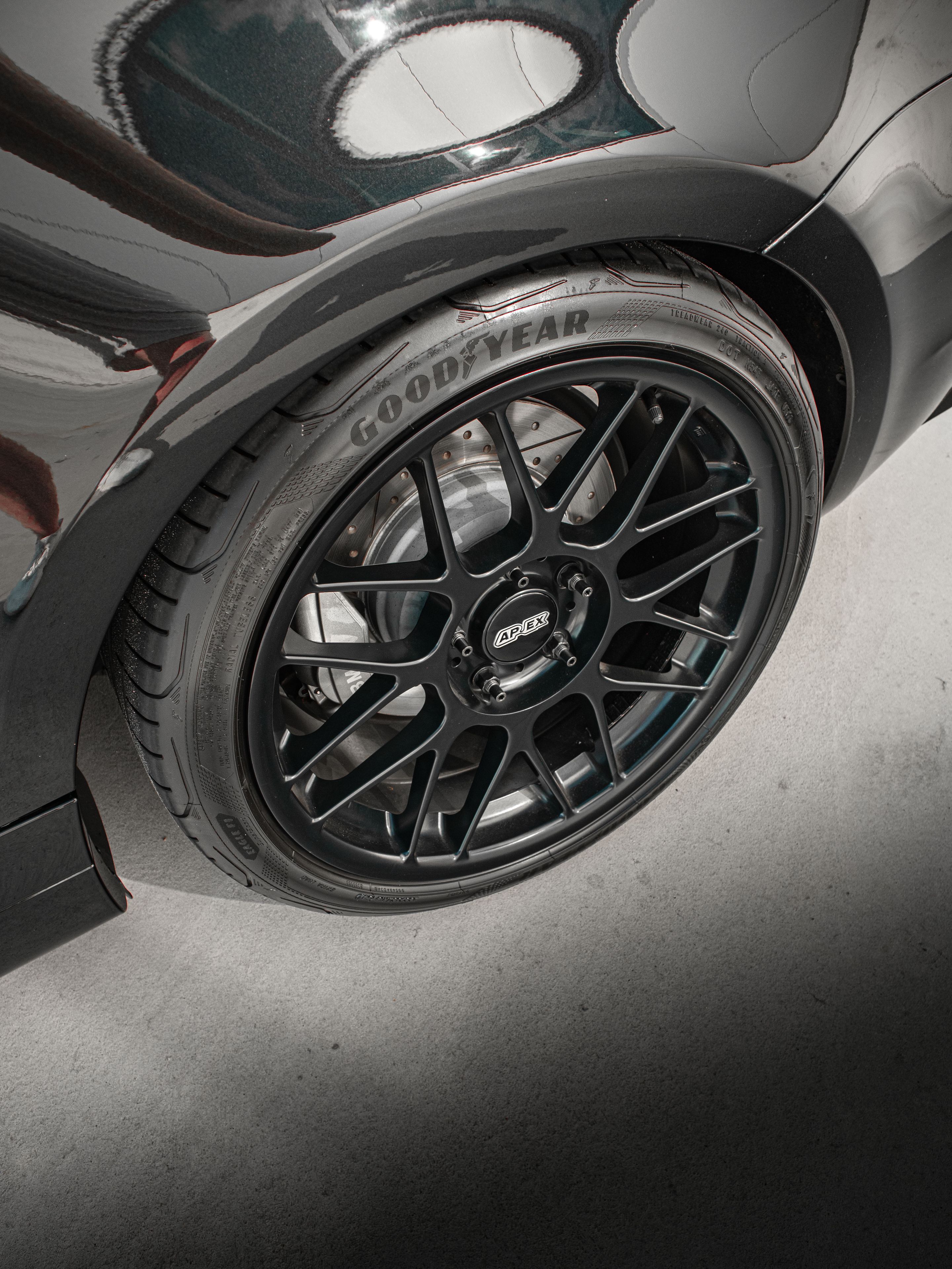 Black BMW E82 Coupe 1 Series with 18" ARC-8 Apex wheels in Satin Black