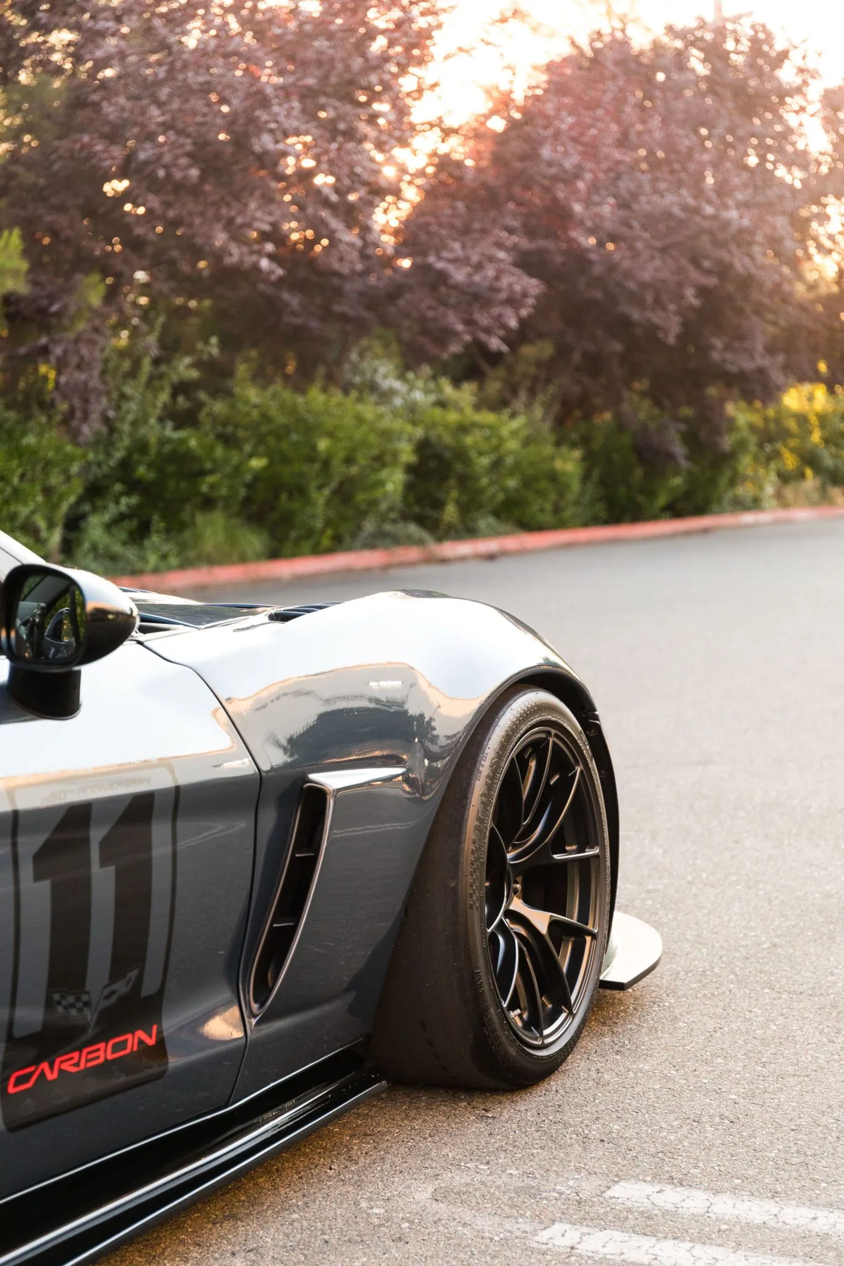 Blue Chevrolet C6 Corvette Z06 with 18" VS-5RS Apex wheels in Satin Black