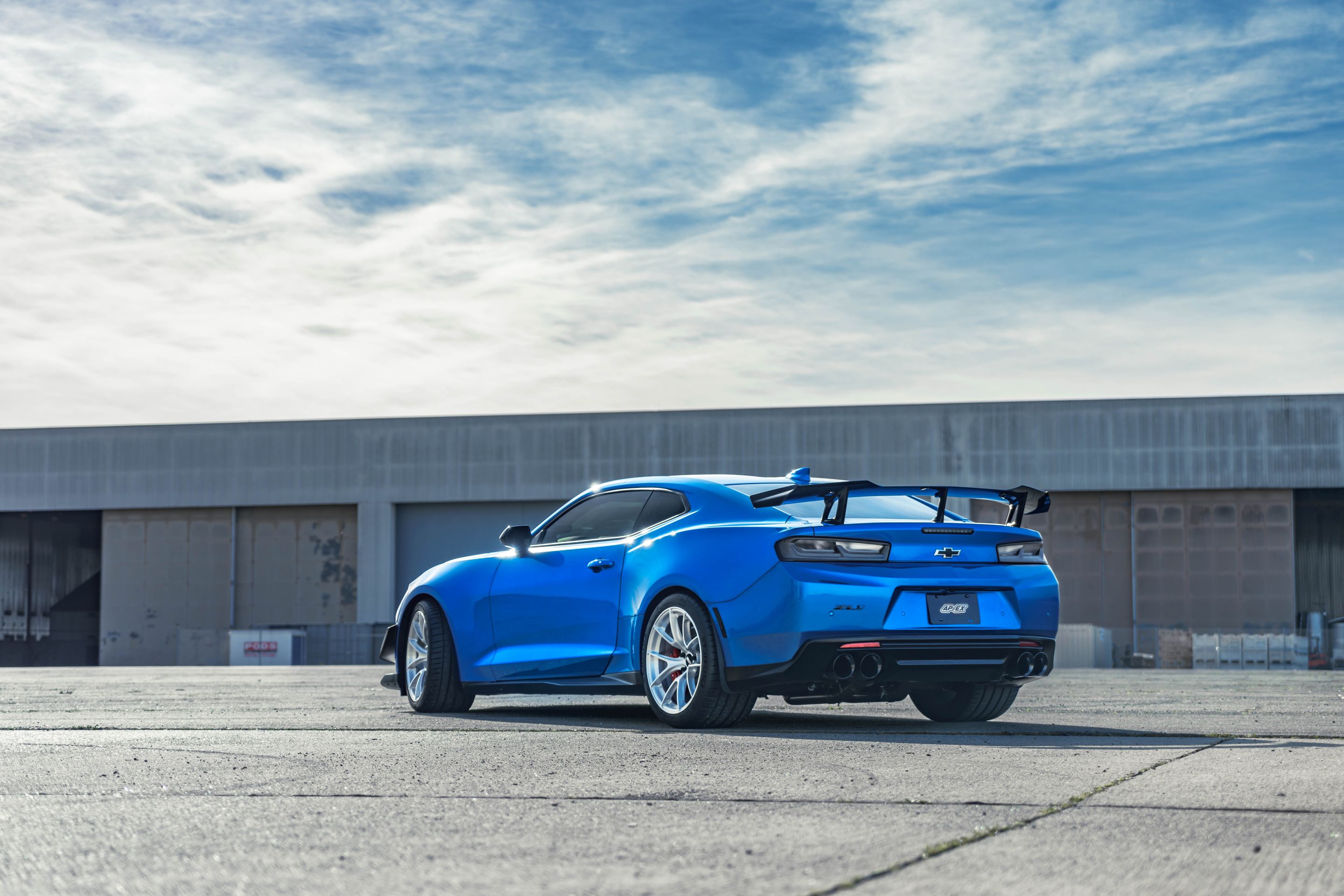 Blue Chevrolet 6th Gen Camaro ZL1 1LE with 19" VS-5RS Apex wheels in Brushed Clear