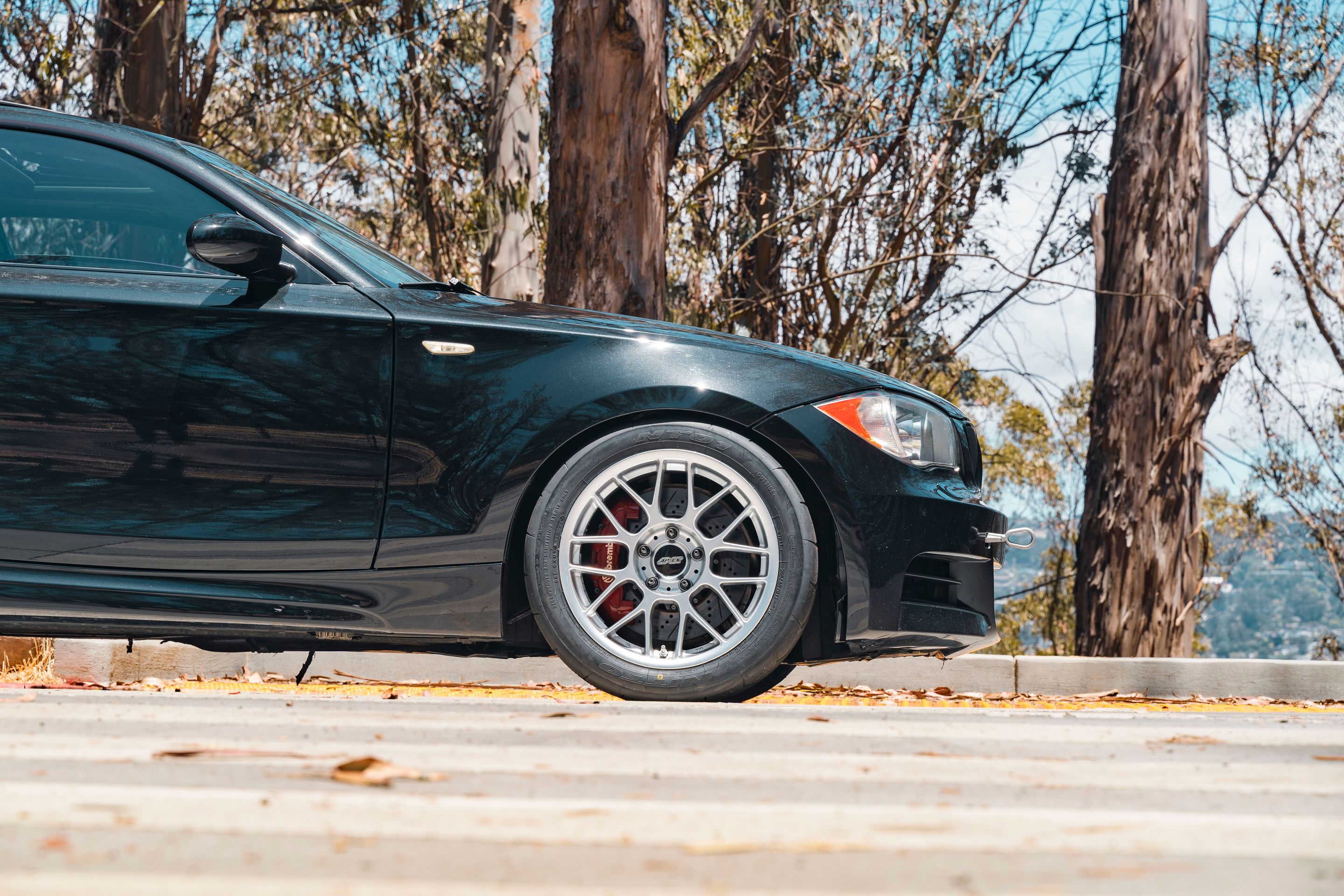 Black BMW E82 Coupe 1 Series with 17" ARC-8 Apex wheels in Race Silver