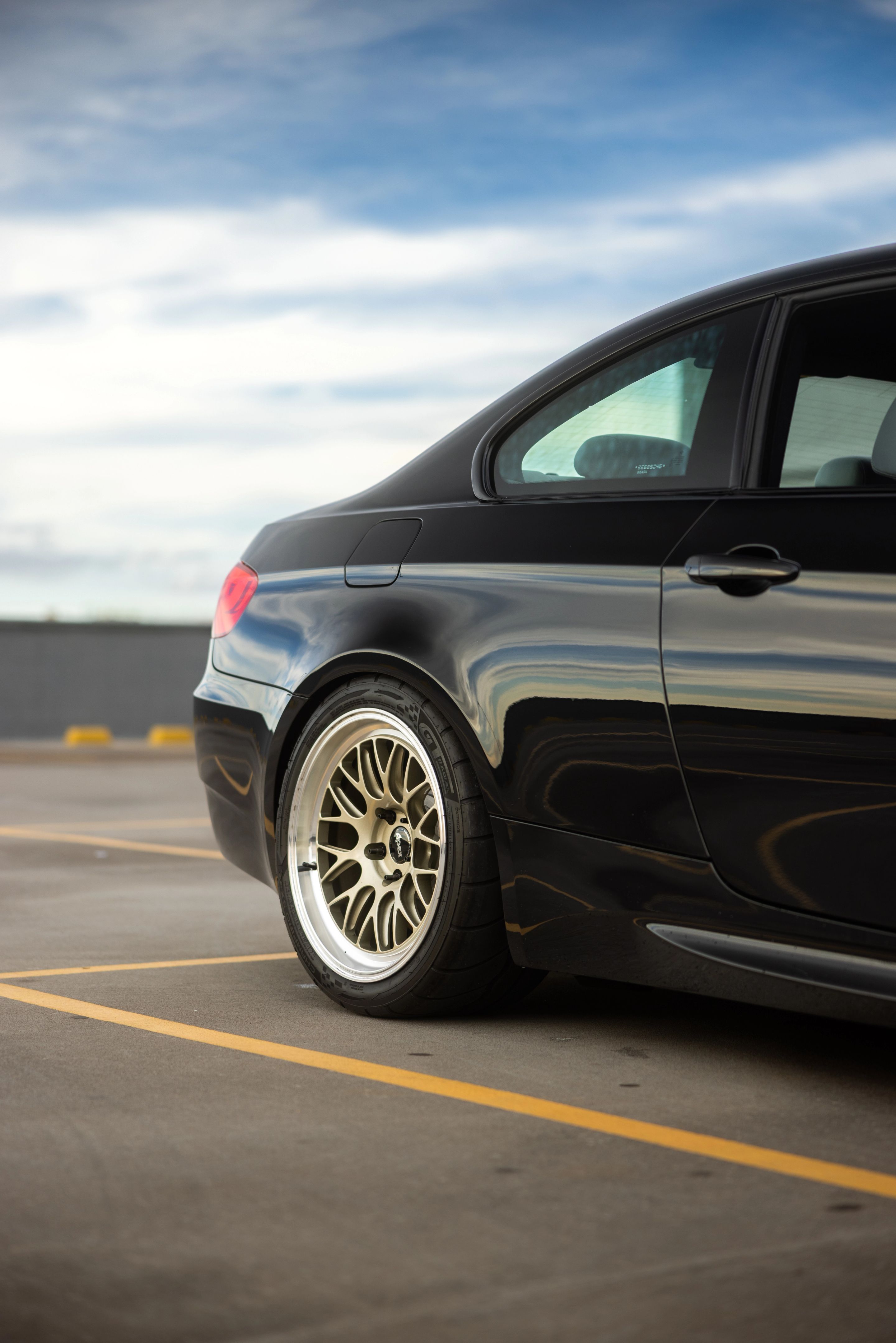 Black BMW E92 Coupe M3 with 18" ML-10RT Apex wheels in Machined Lip Gloss Motorsport Gold