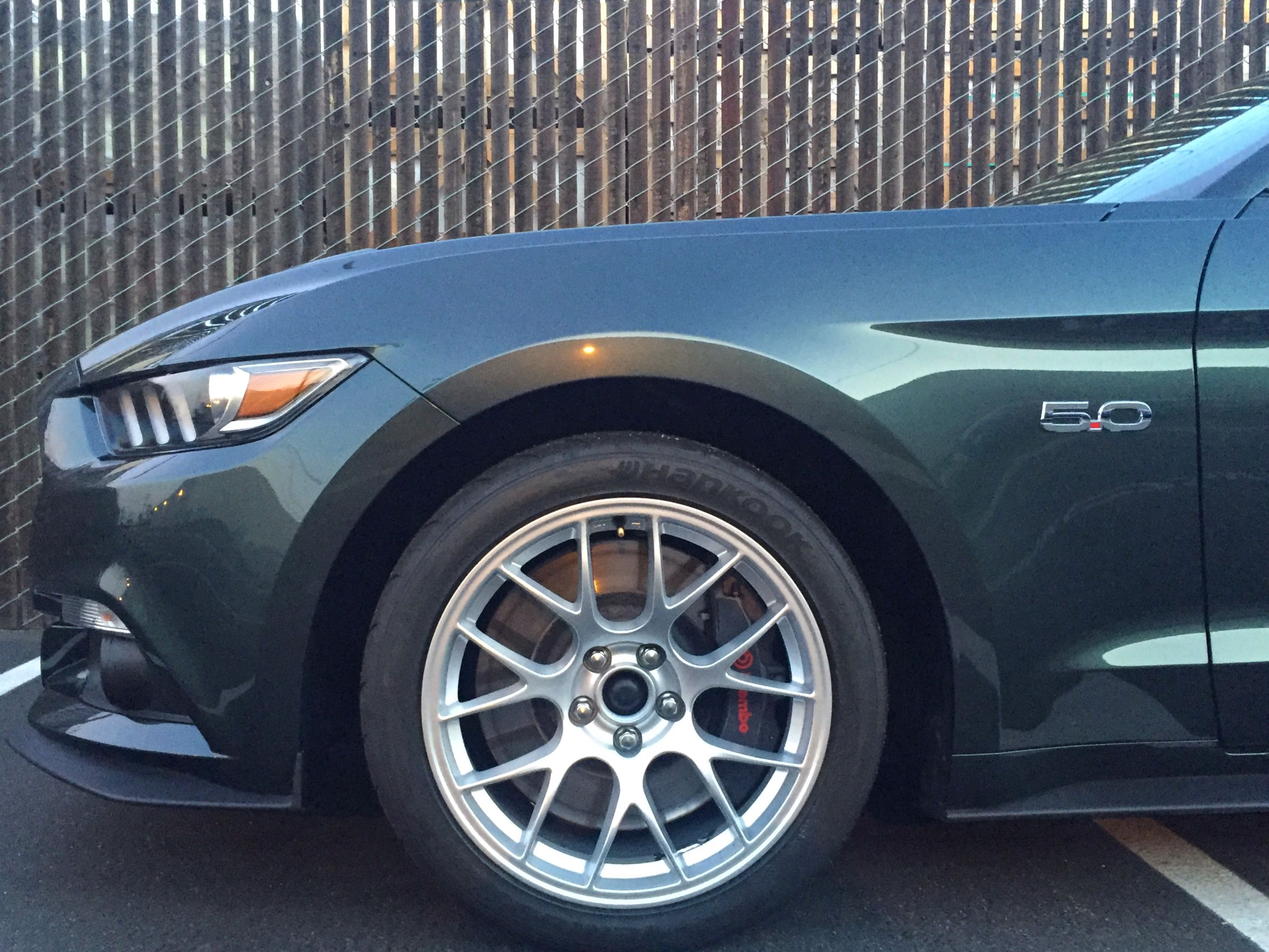 Green Ford S550 Mustang GT with 18" EC-7 Apex wheels in Race Silver