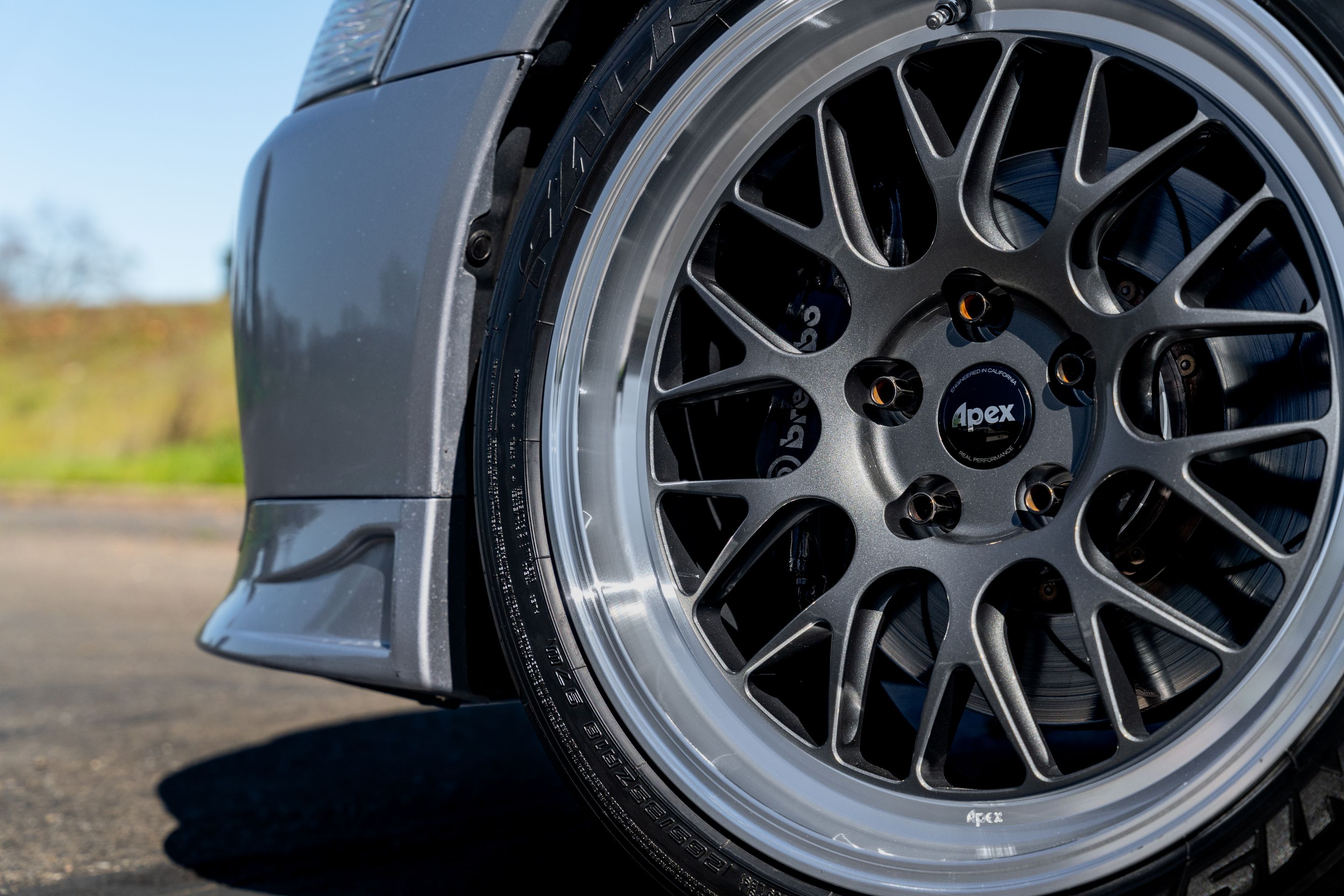 Silver Mitsubishi Lancer Evolution IX with 18" ML-10RT Apex wheels in Machined Lip Anthracite