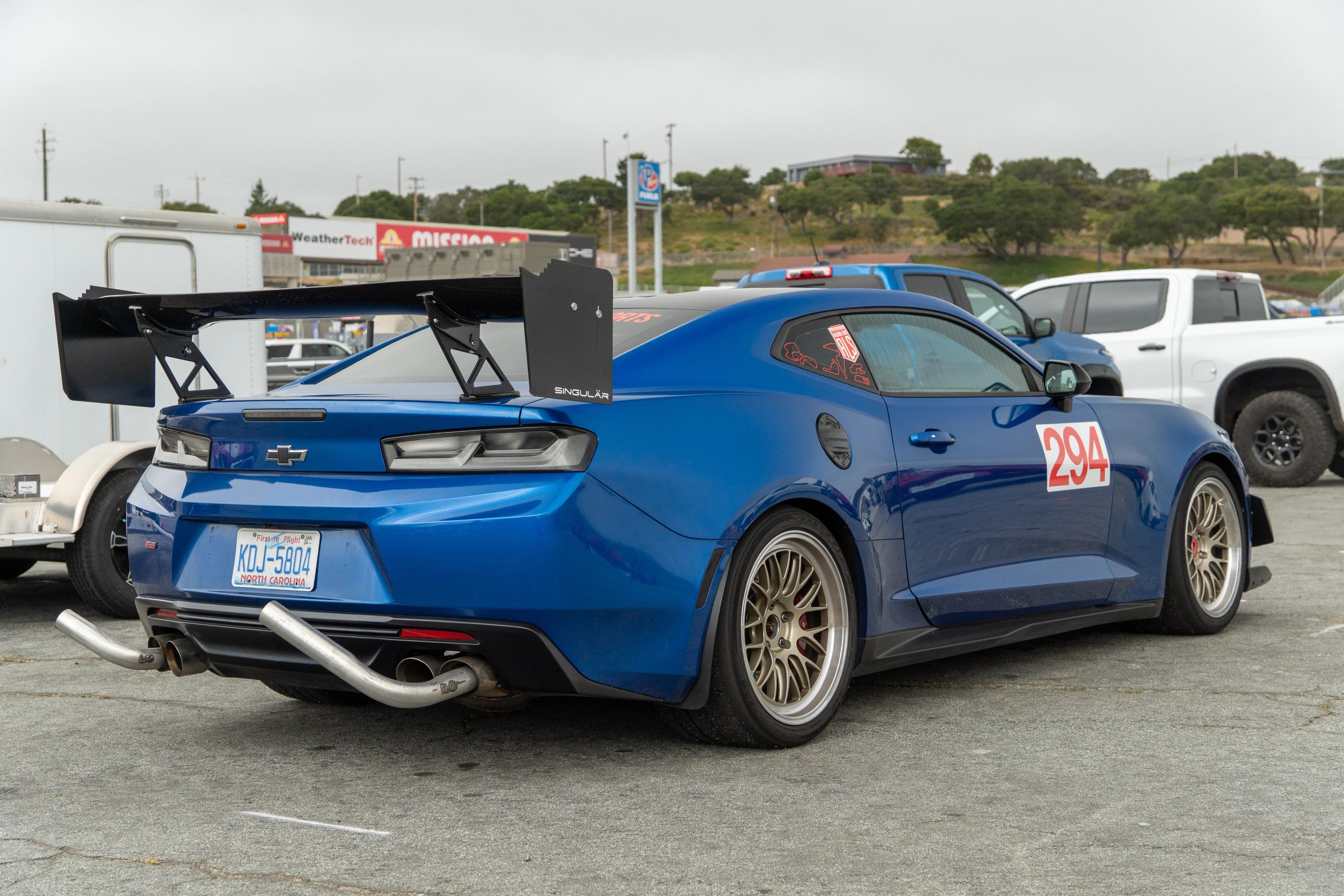 Blue Chevrolet 6th Gen Camaro SS with 19" ML-10RT Apex wheels in Machined Lip Gloss Motorsport Gold