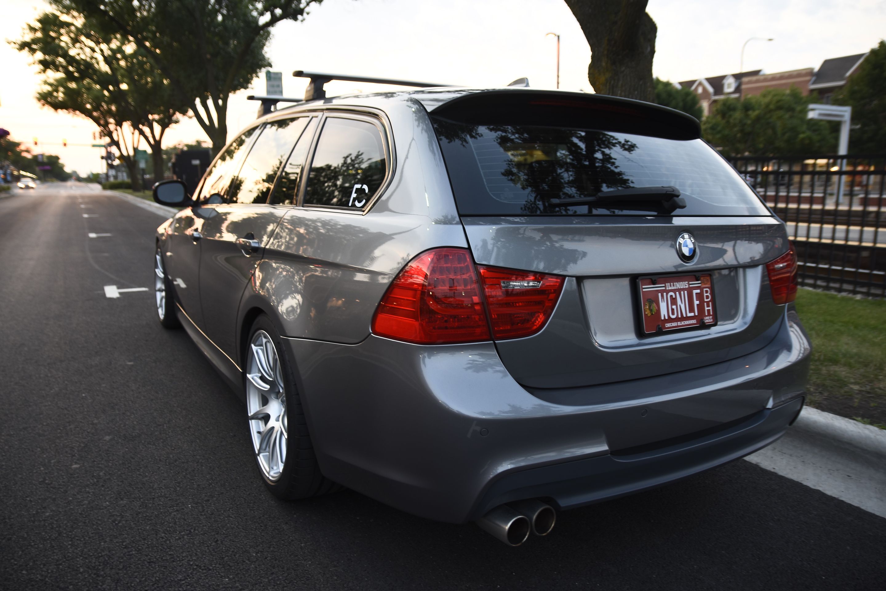 Grey BMW E91 LCI Wagon 3 Series with 18" SM-10 Apex wheels in Race Silver