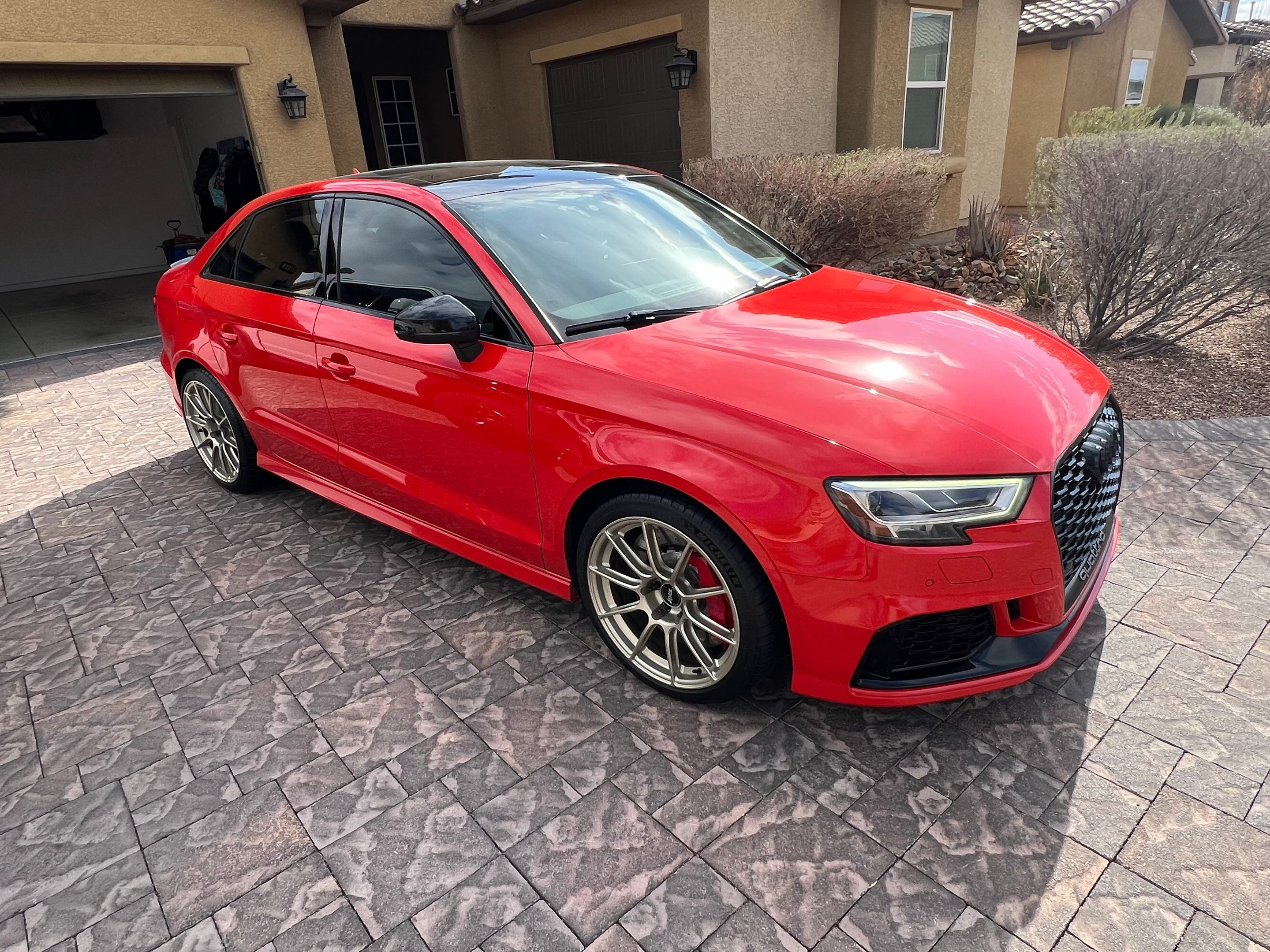 Red Audi 8V RS 3 with 18" SM-10RS Apex wheels in Motorsport Gold
