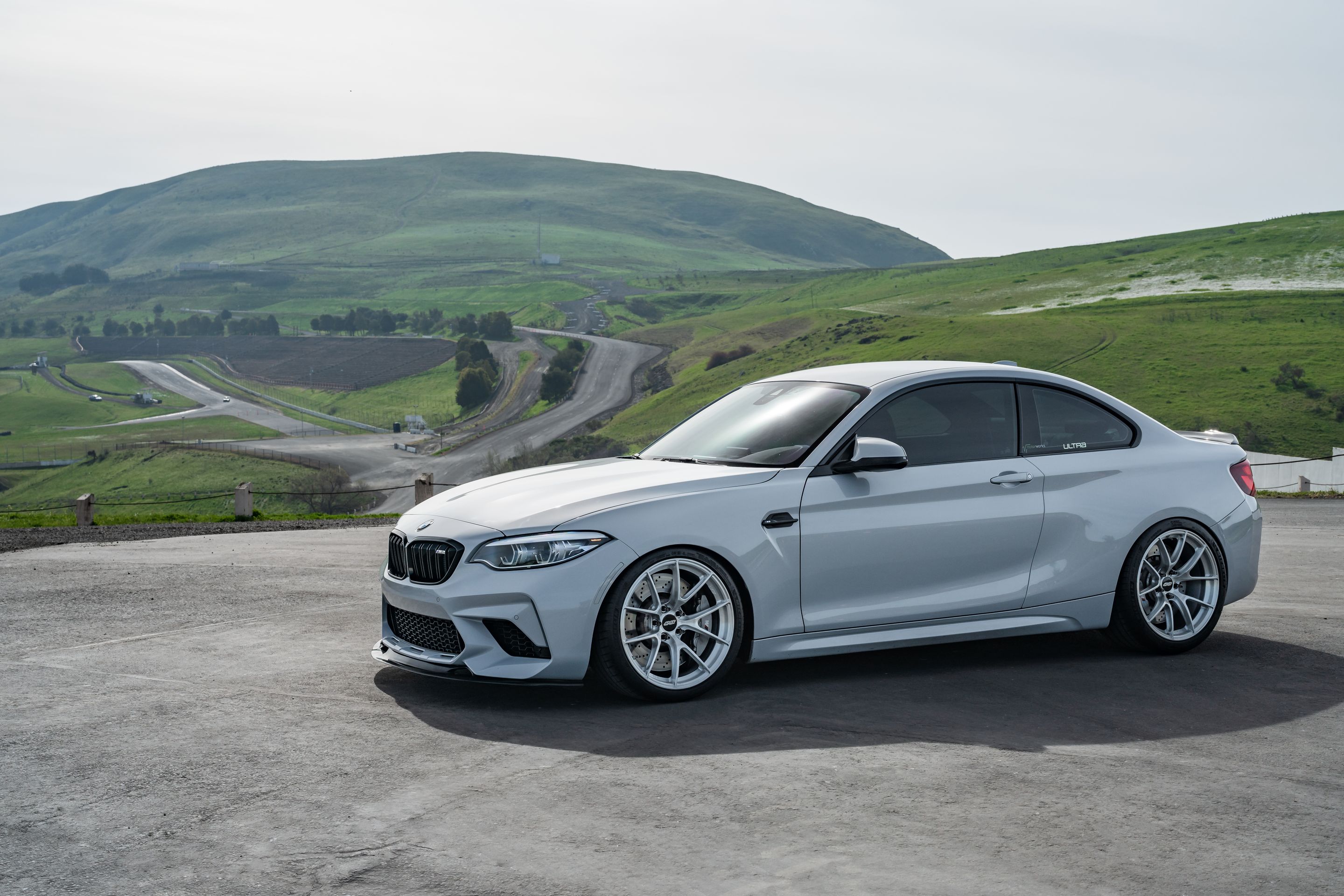 Silver BMW F87 M2 with 19" VS-5RS Apex wheels in Brushed Clear