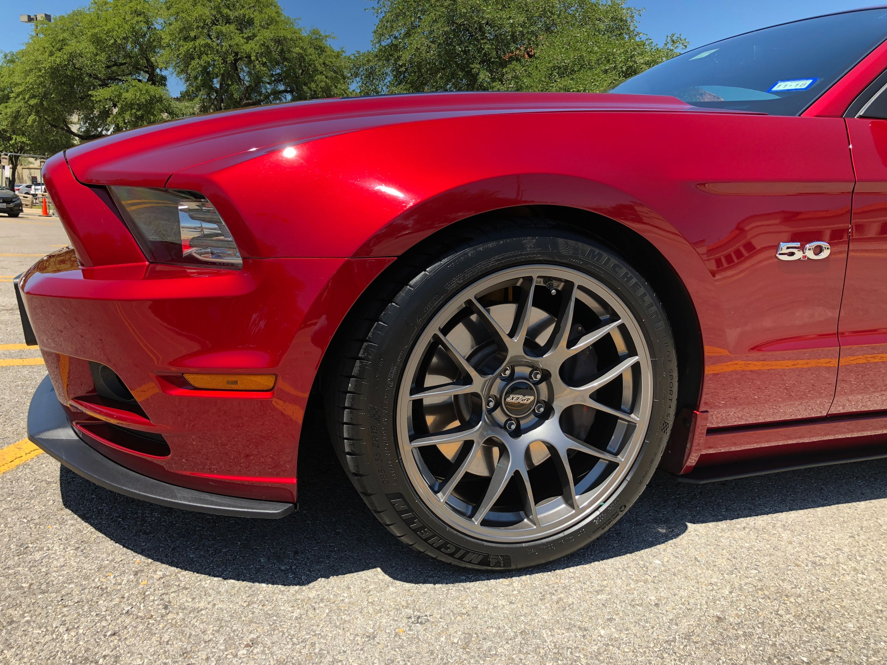 Red Ford S197 Mustang GT with 19" EC-7 Apex wheels in Anthracite