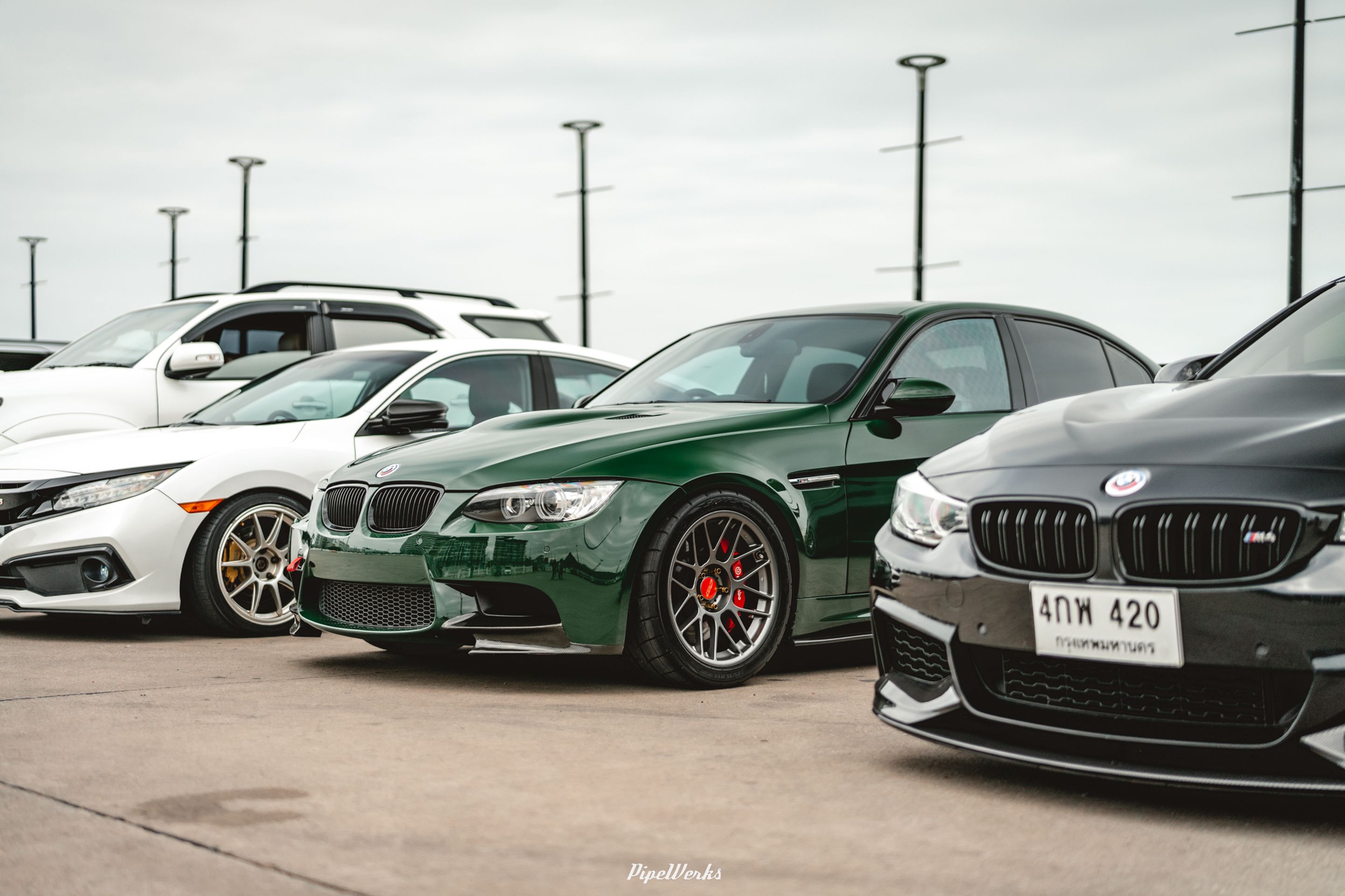 Green BMW E90 Sedan 3 Series with 18" ARC-8 Apex wheels in Anthracite