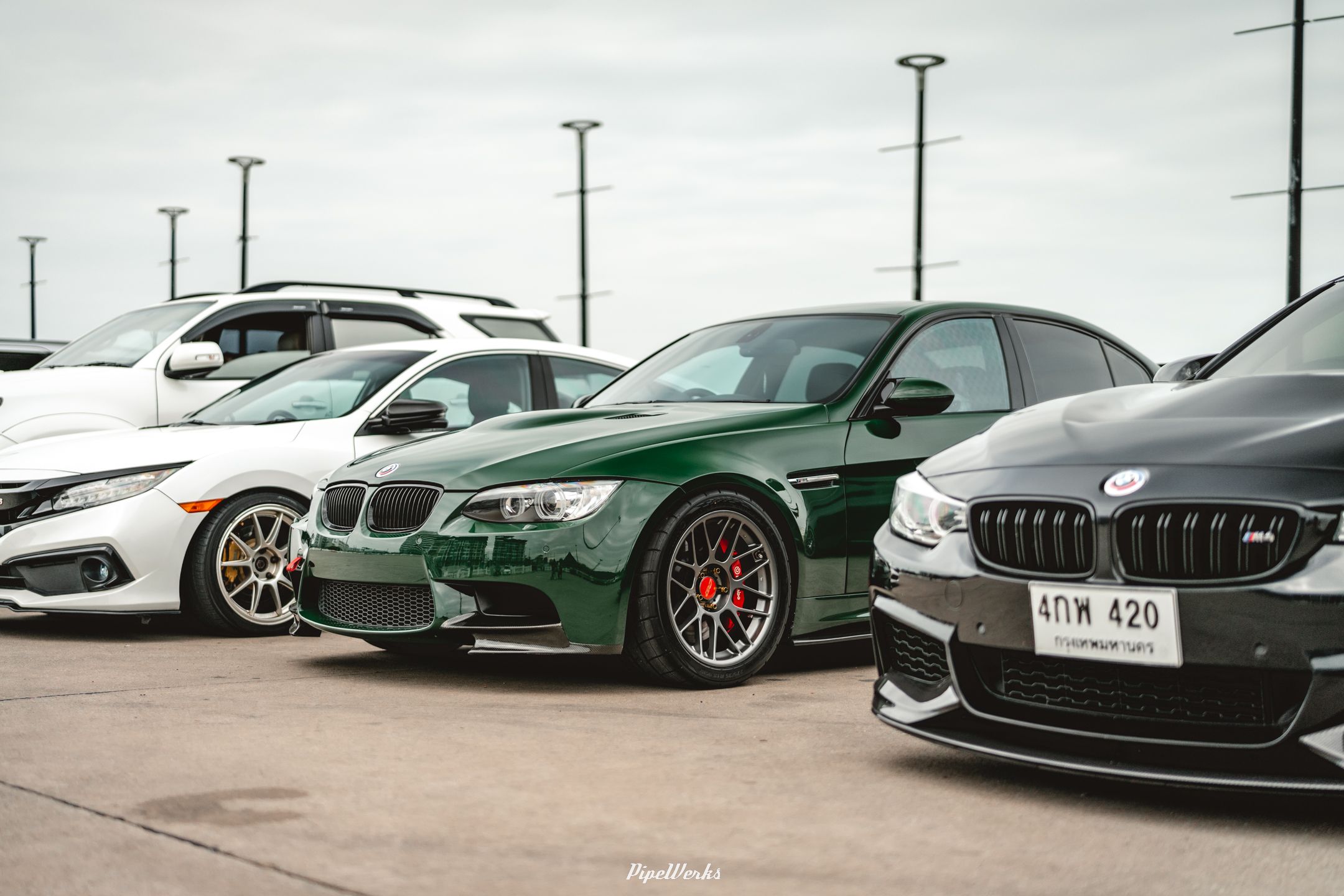 Green BMW E90 Sedan 3 Series with 18" ARC-8 Apex wheels in Anthracite