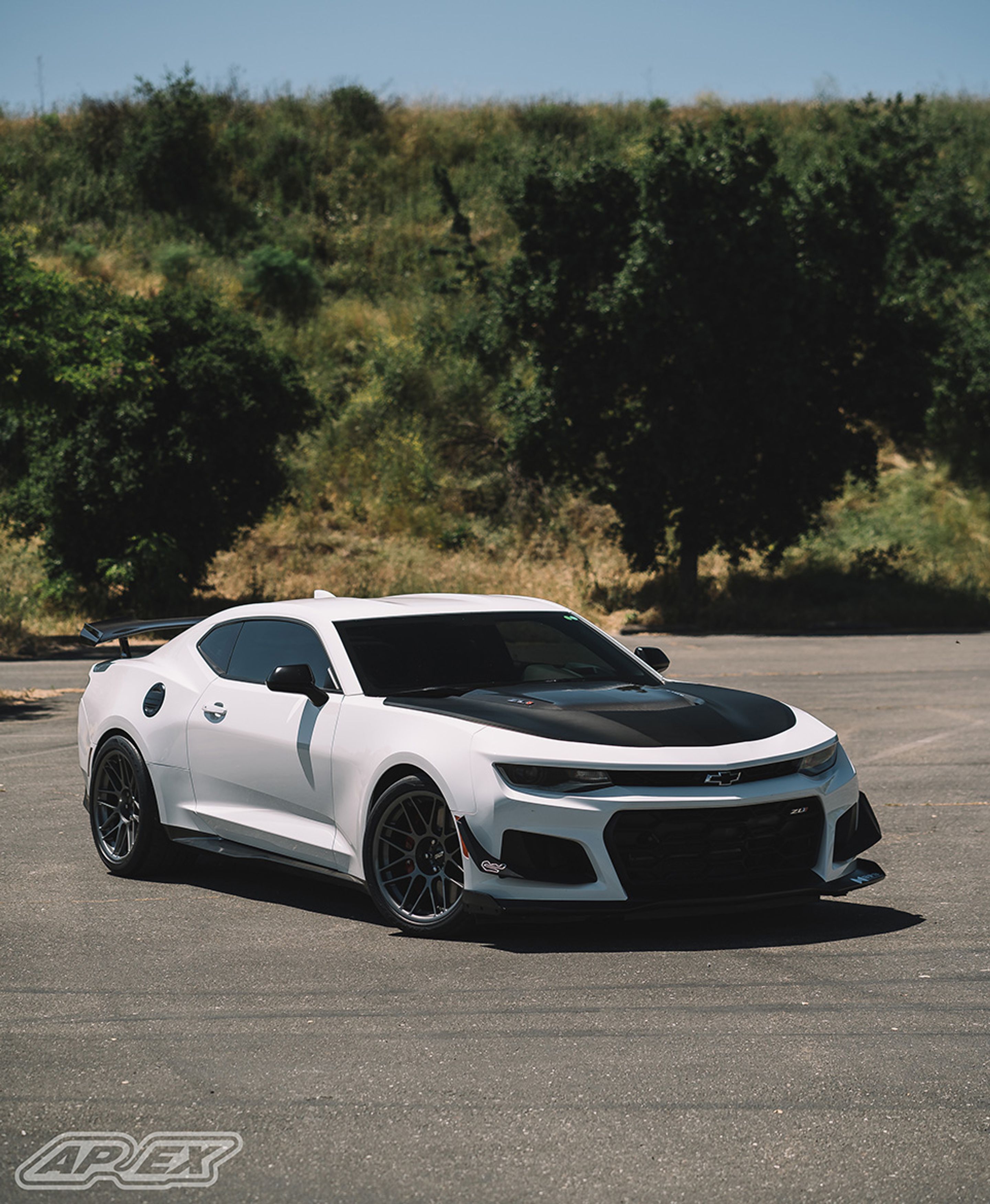 White Chevrolet 6th Gen Camaro ZL1 1LE with 19" ARC-8 Apex wheels in Anthracite