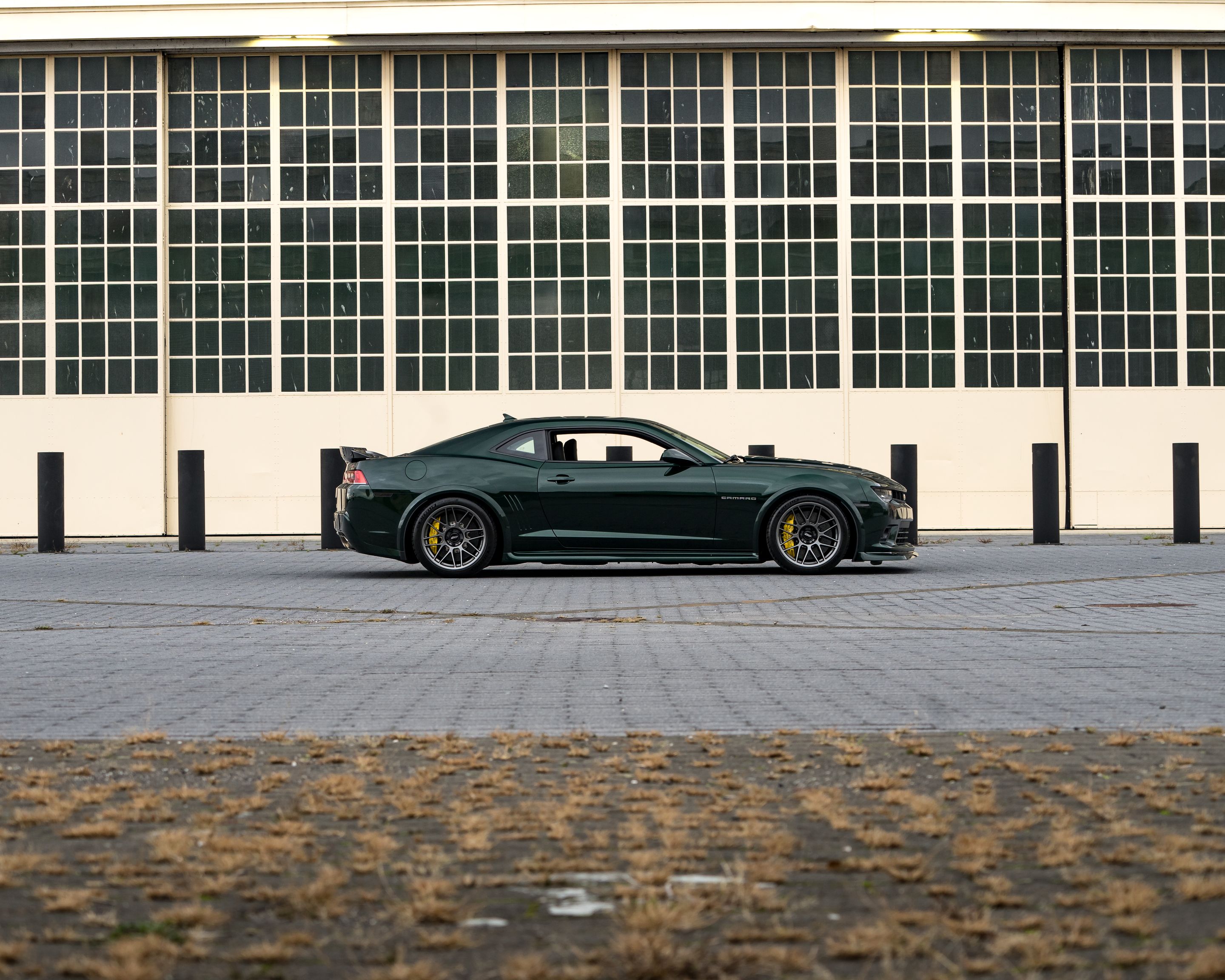 Green Chevrolet 5th Gen Camaro SS with 19" ARC-8 Apex wheels in Anthracite