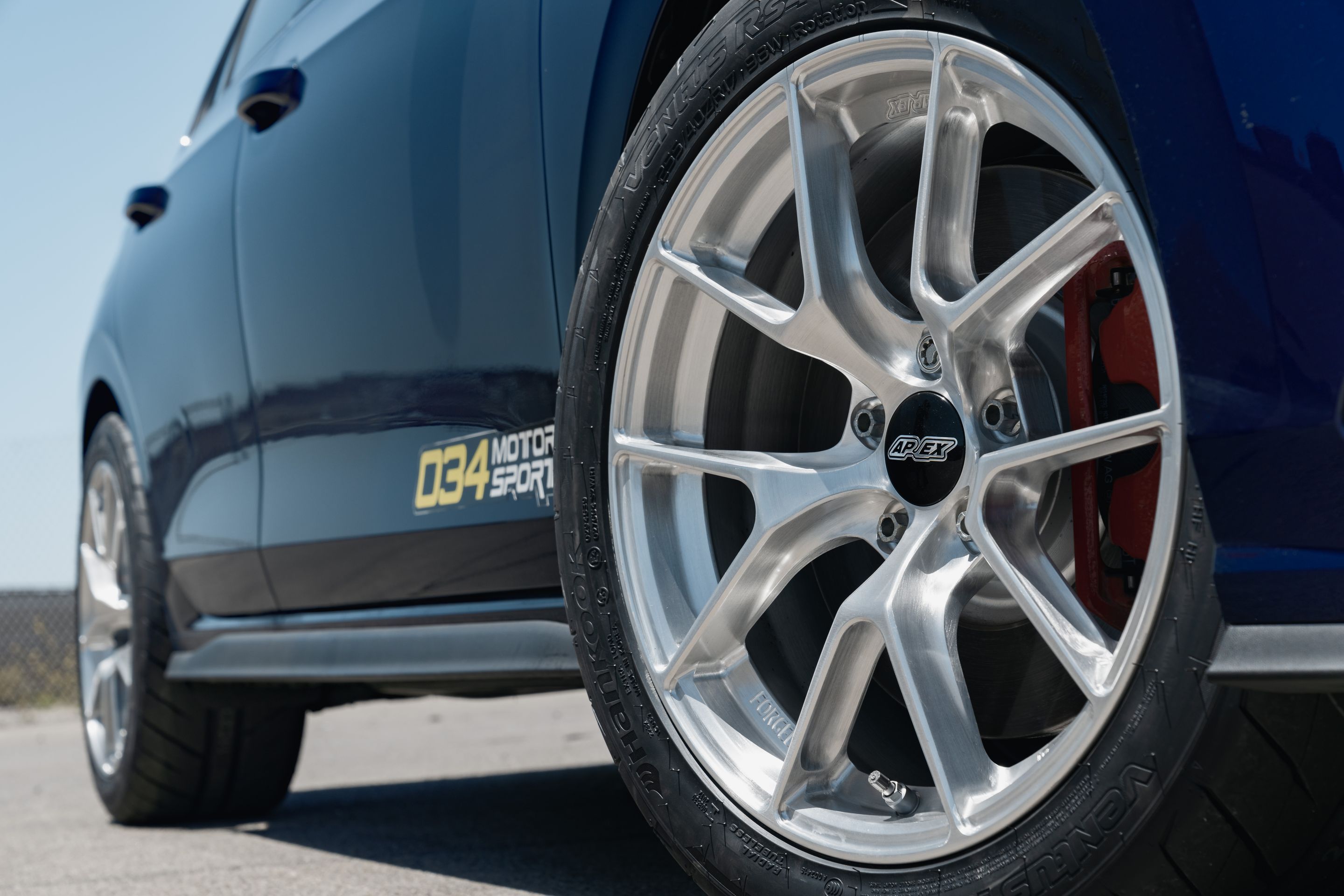 Blue VW MK8 GTI with 17" VS-5RS Apex wheels in Brushed Clear