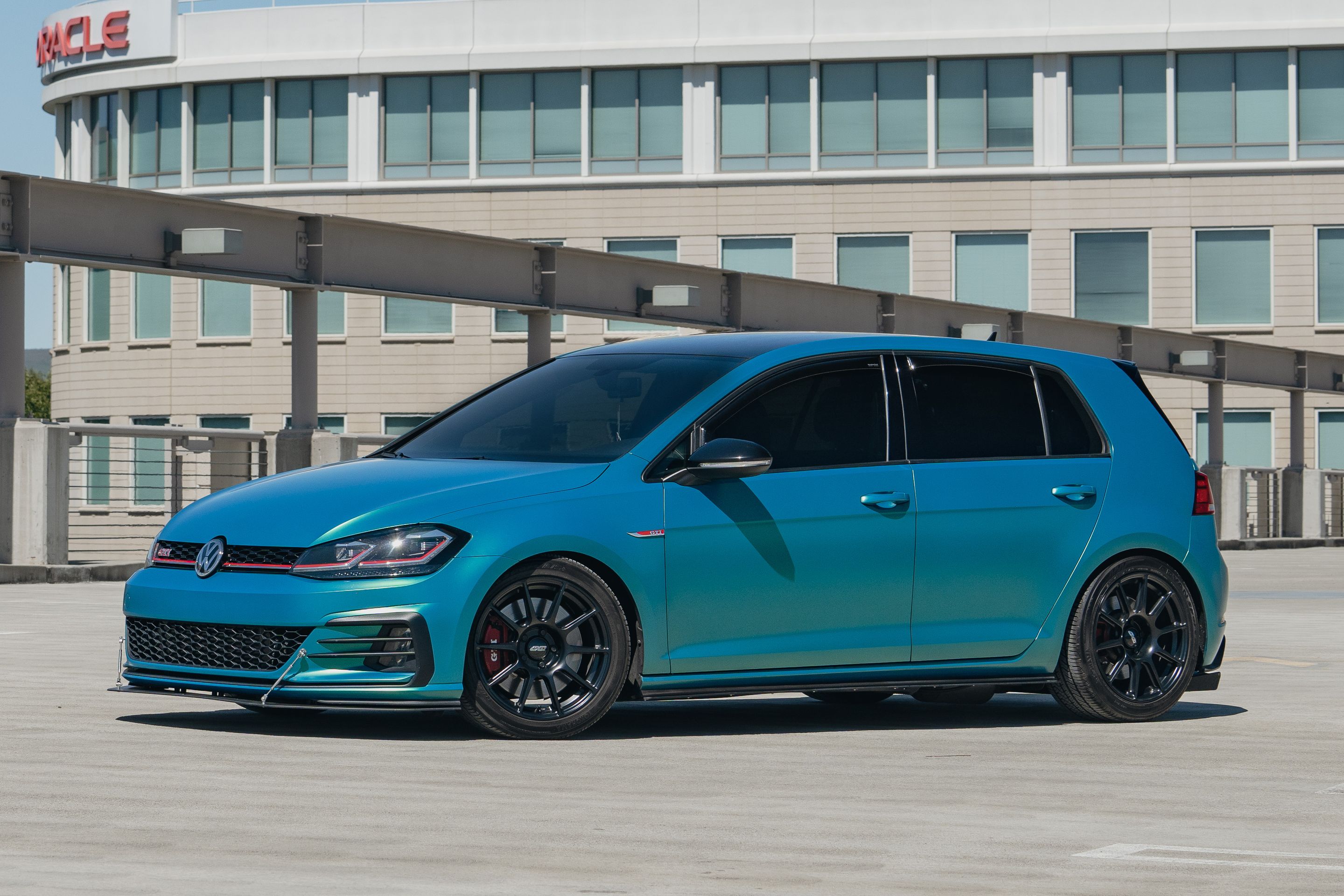 Green VW MK7 GTI with 17" SM-10 Apex wheels in Satin Black