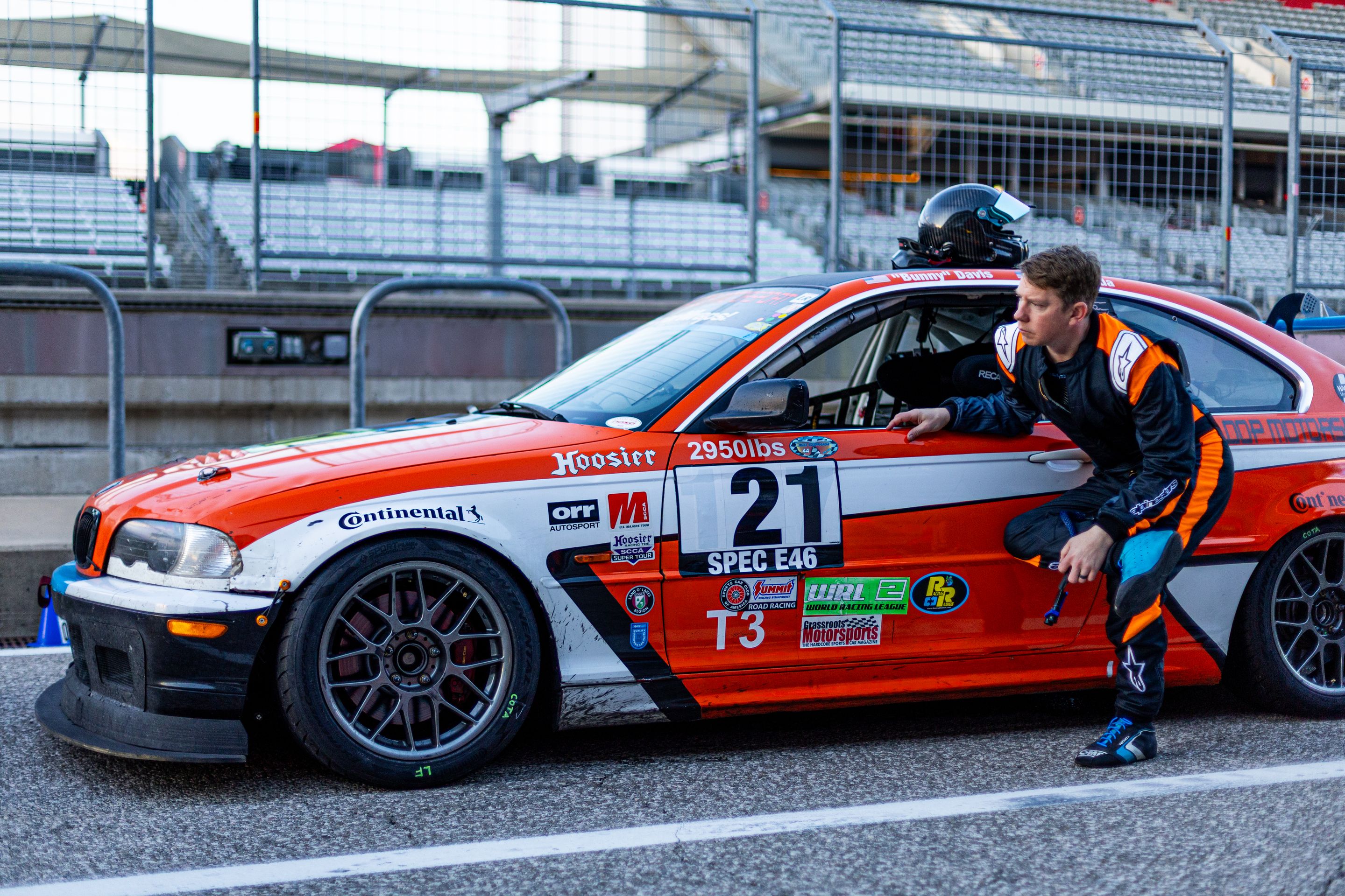 Orange BMW Spec E46 with 17" ARC-8 Apex wheels in Hyper Black