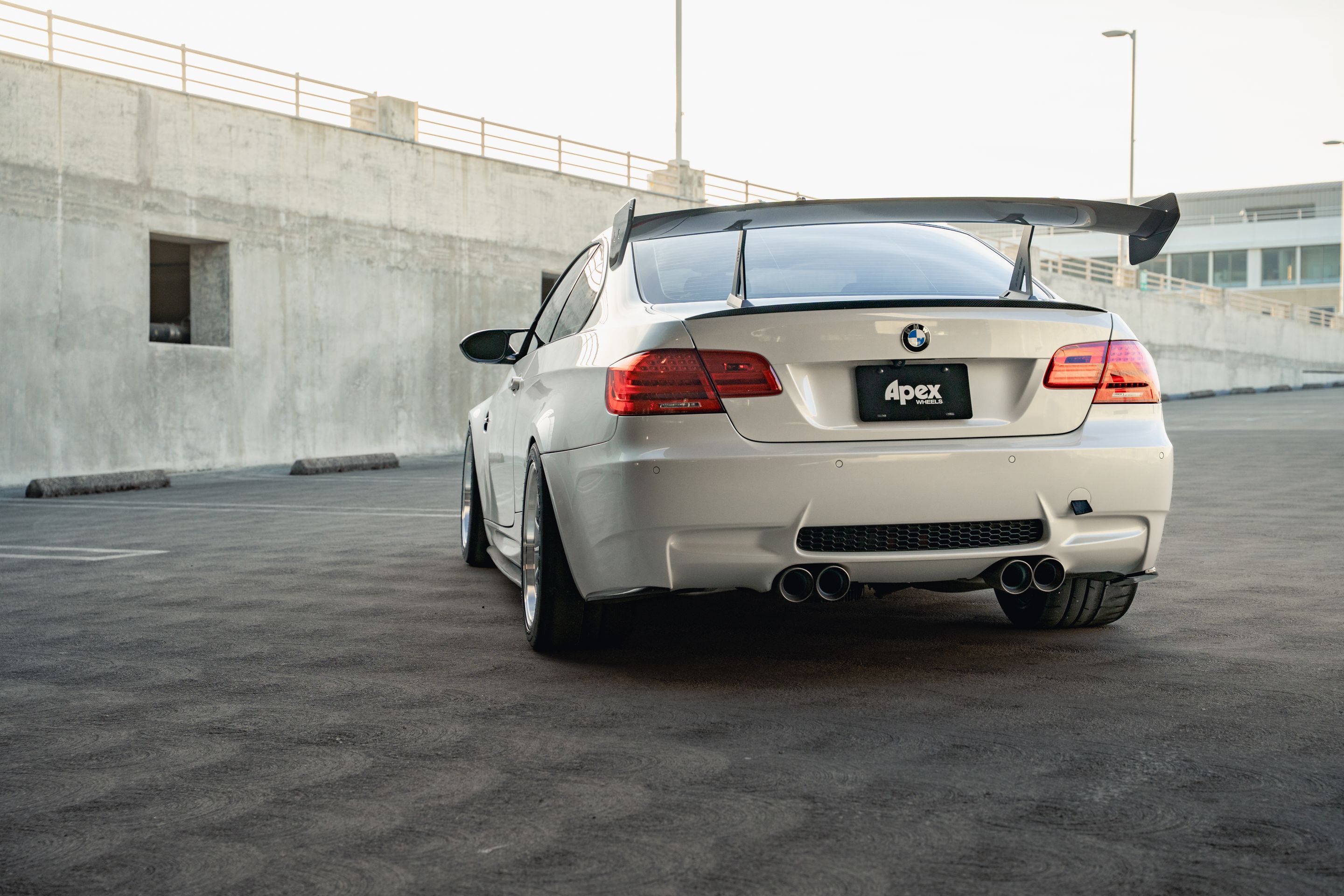 White BMW E92 Coupe M3 with 18" SL-12 Apex wheels in Machined Lip Race Silver