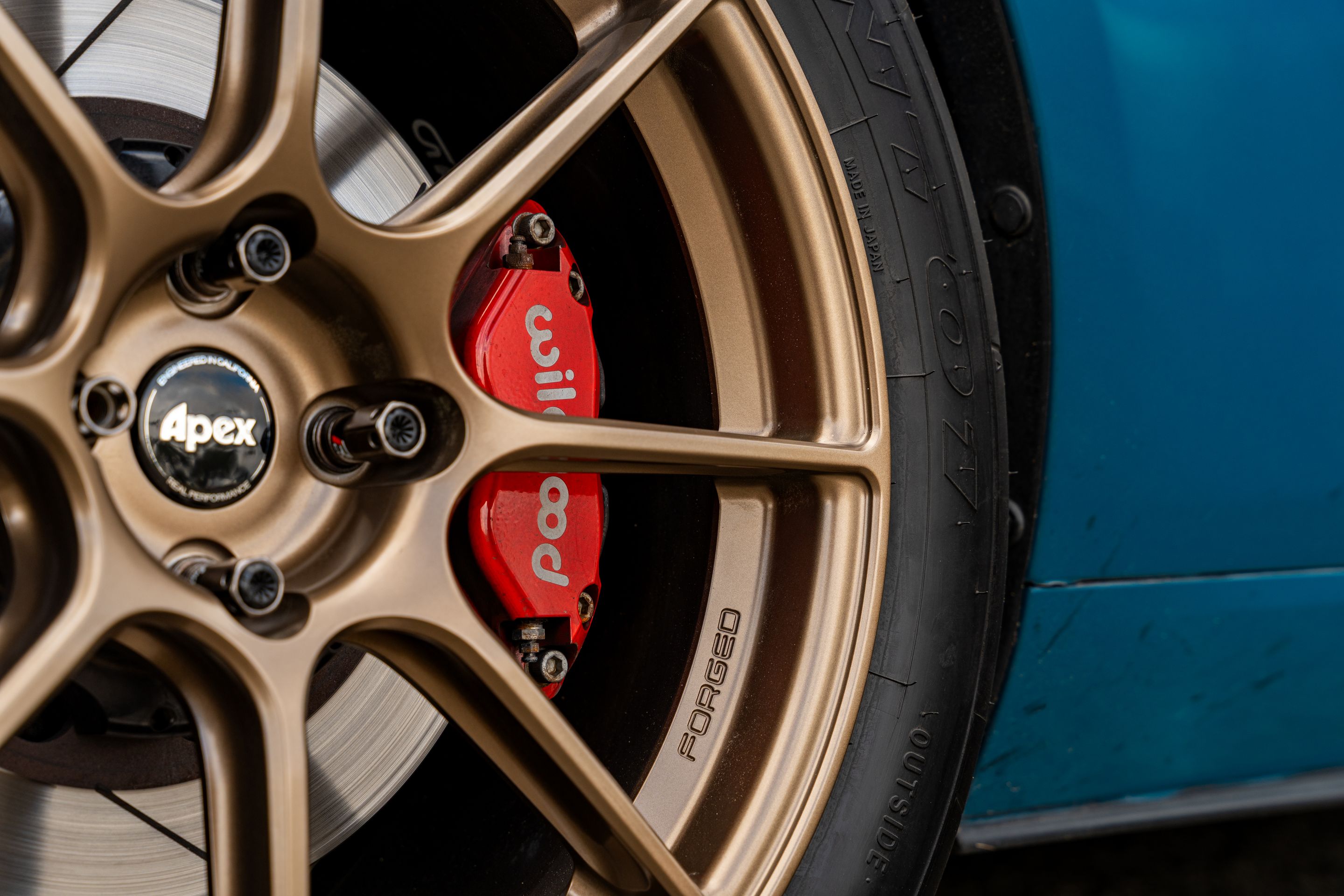 Blue Mazda ND MX-5 Miata with 17" SM-8RS Apex wheels in Satin Bronze