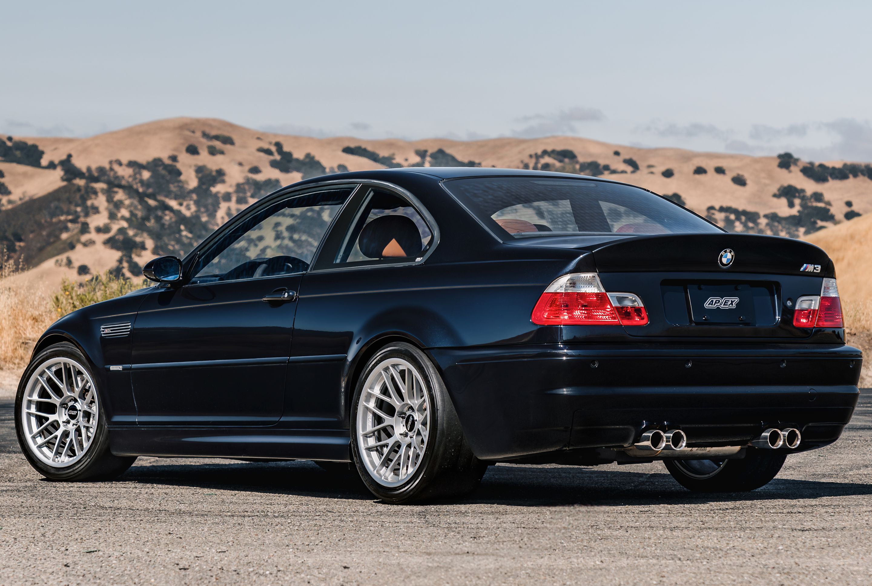 Black BMW E46 M3 with 18" ARC-8RT Apex wheels in Race Silver