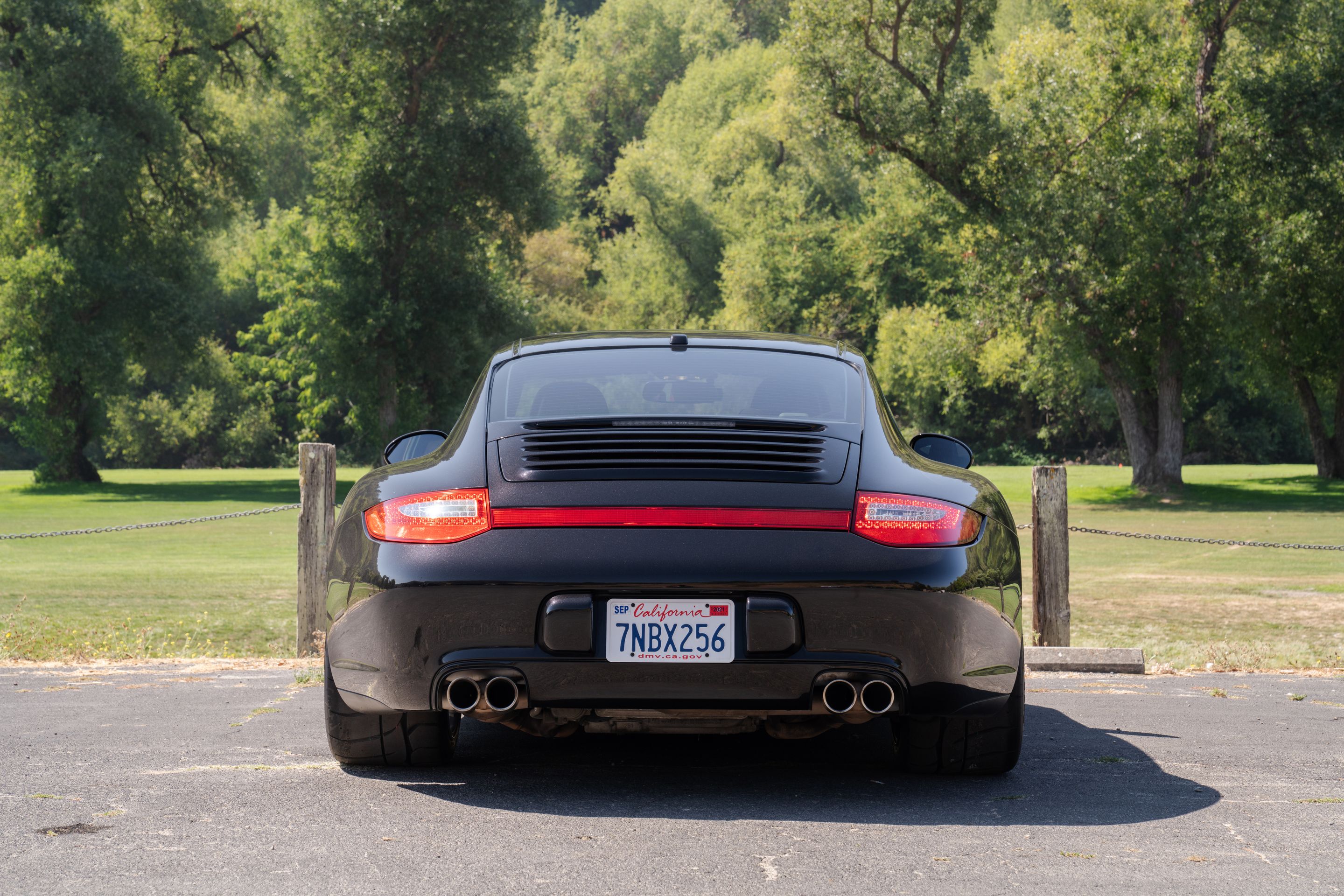 Black Porsche 911 997 Carrera 4S with 18" EC-7RS Apex wheels in Race Silver