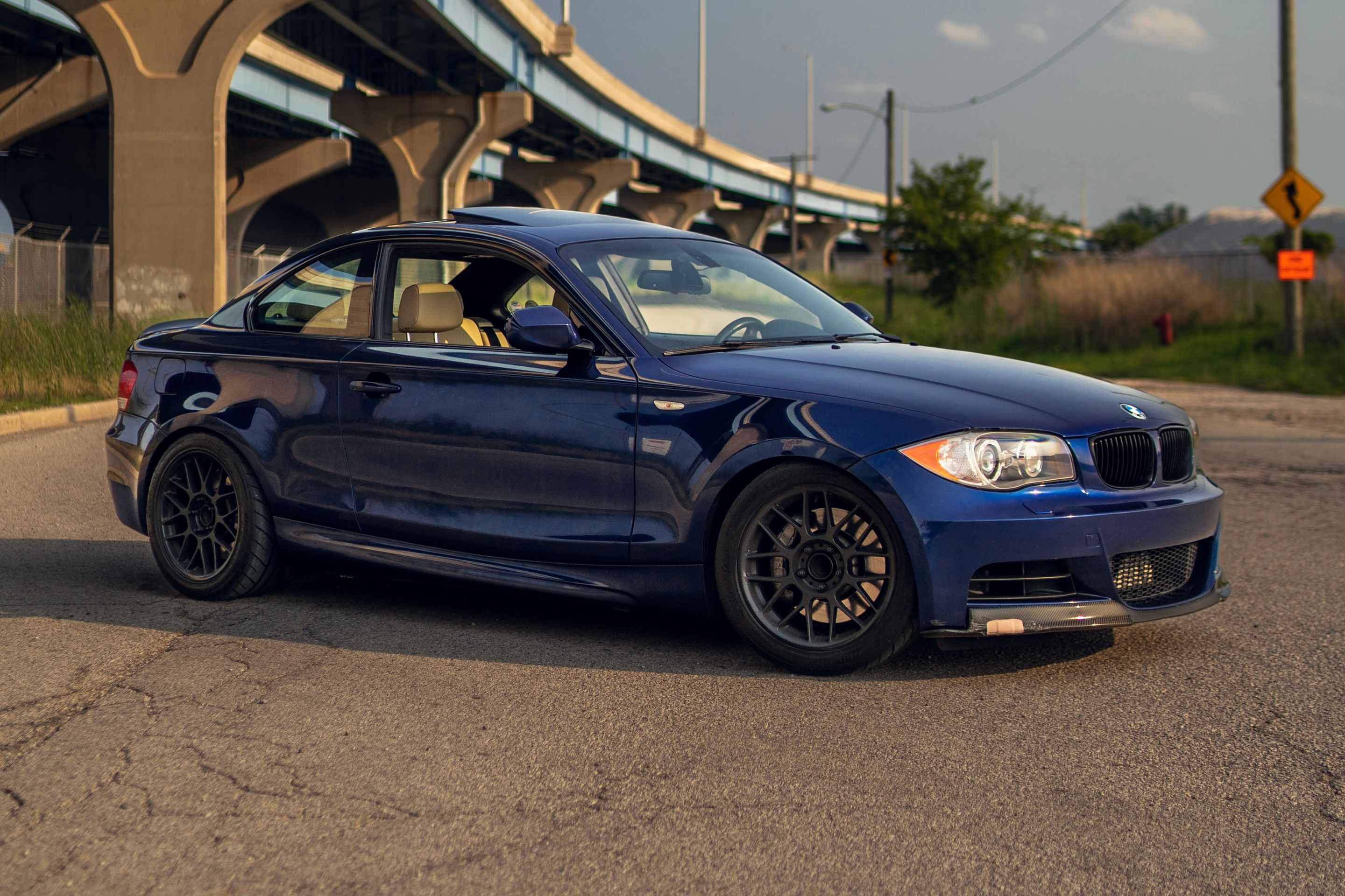Blue BMW E82 Coupe 1 Series with 17" ARC-8 Apex wheels in Satin Black
