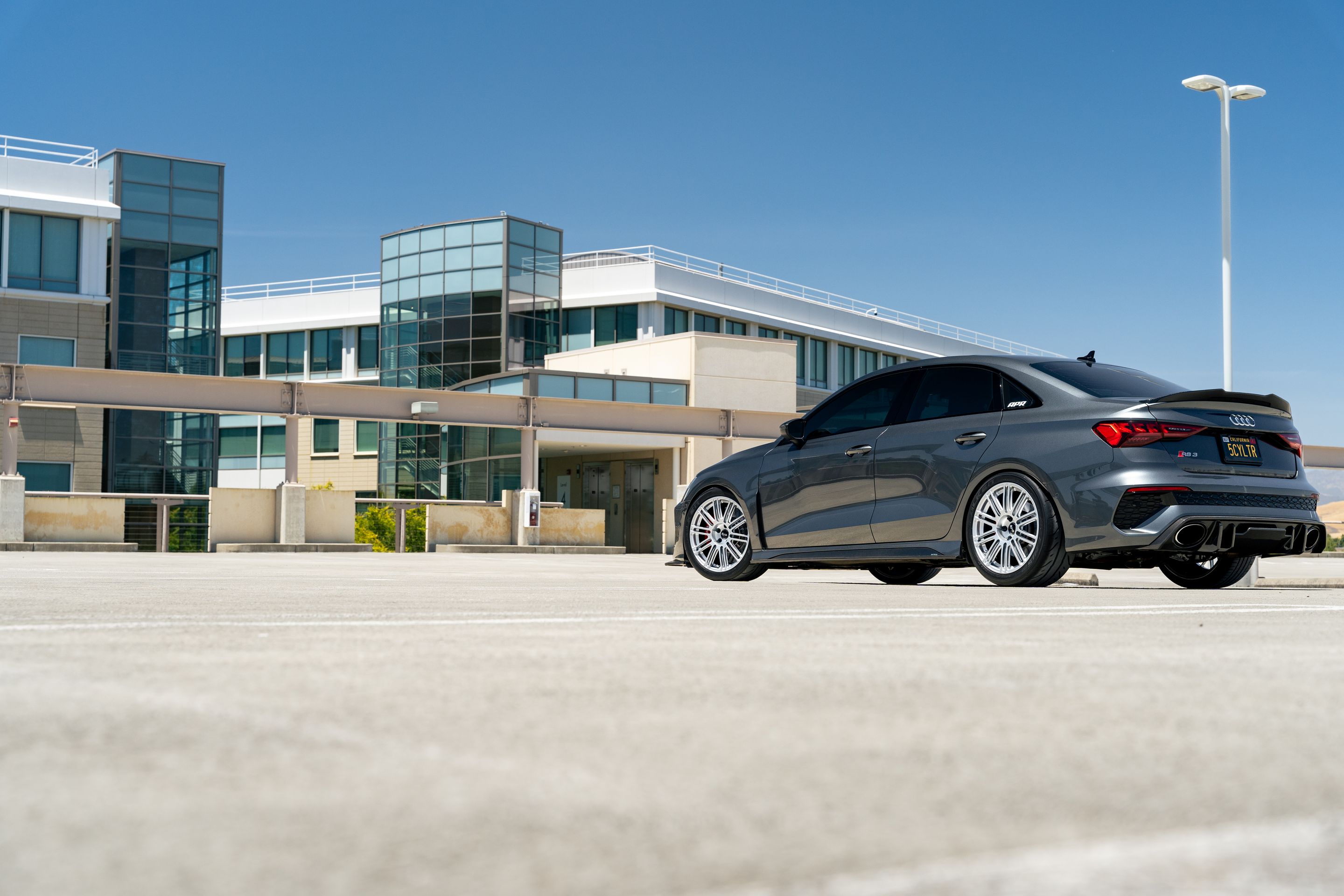 Grey Audi 8Y RS 3 with 18" TC-10RT Apex wheels in Race Silver