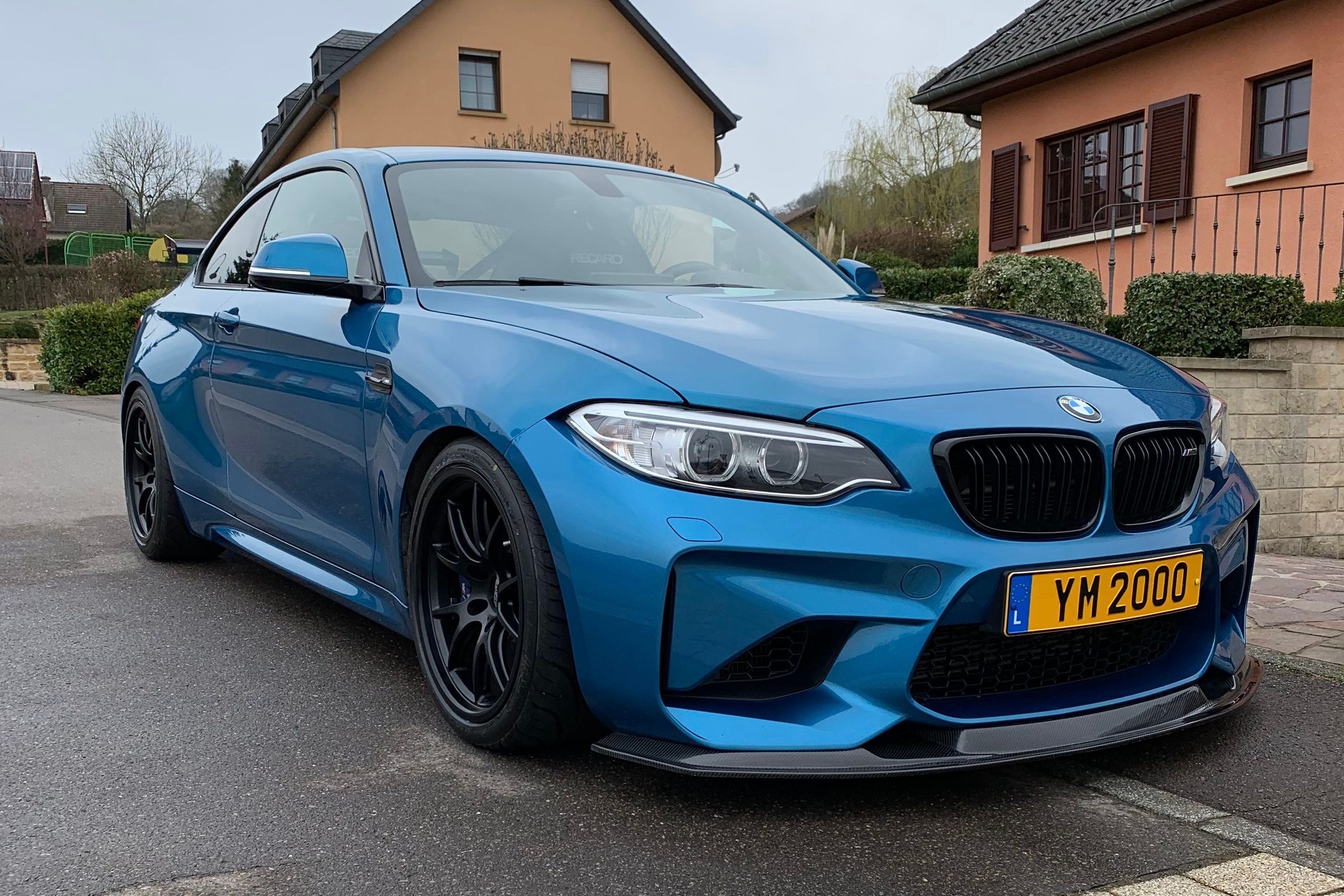 Blue BMW F87 M2 with 18" FL-5 Apex wheels in Satin Black