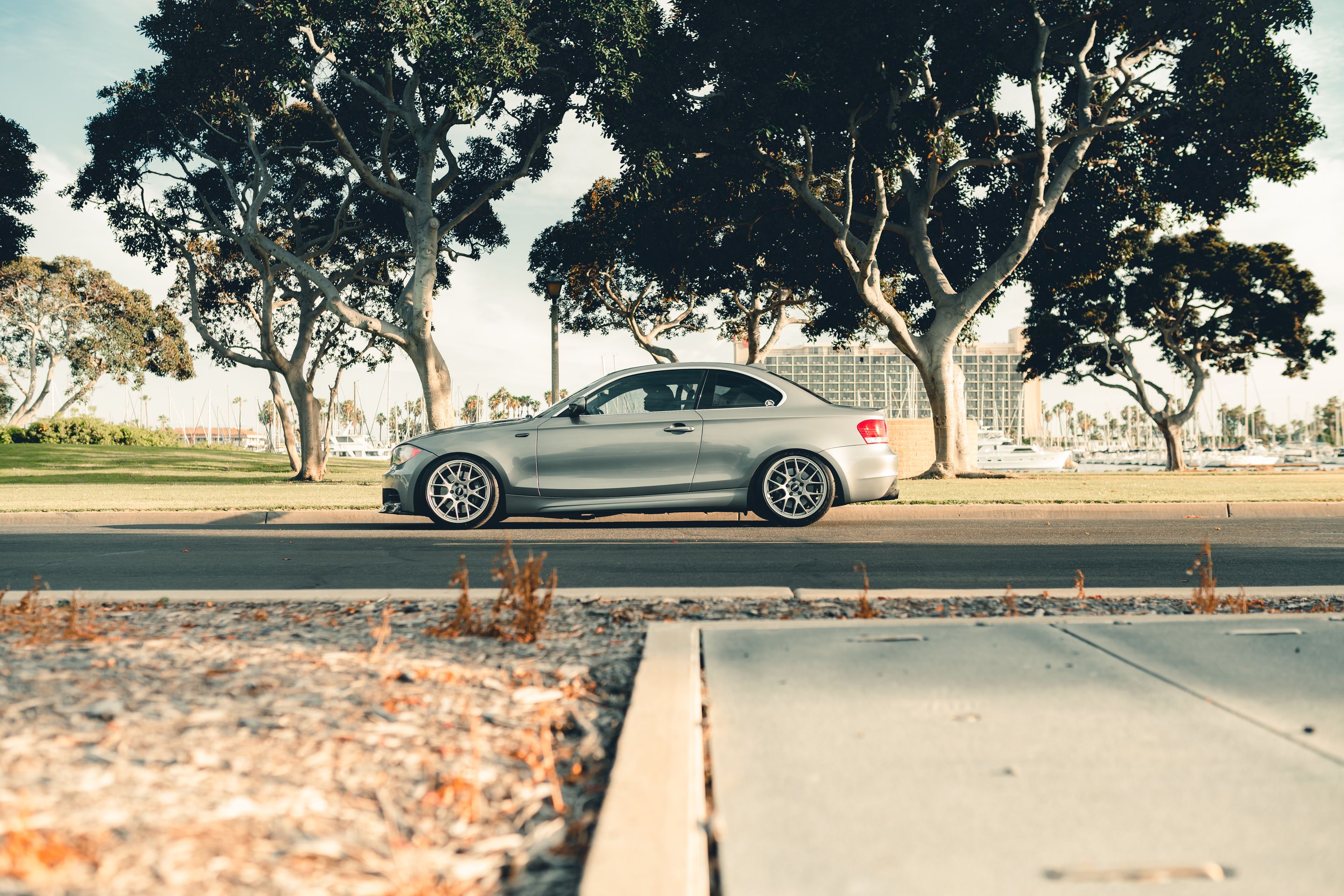 Grey BMW E82 Coupe 1 Series with 18" EC-7 Apex wheels in Race Silver