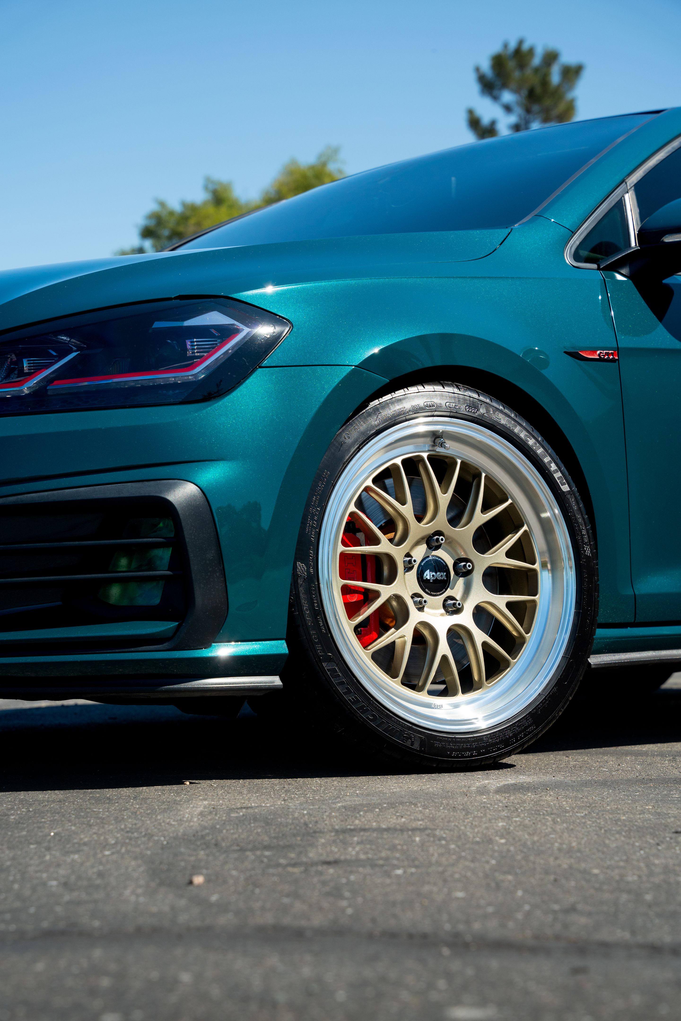 Green VW MK7 GTI with 18" ML-10RT Apex wheels in Machined Lip Gloss Motorsport Gold