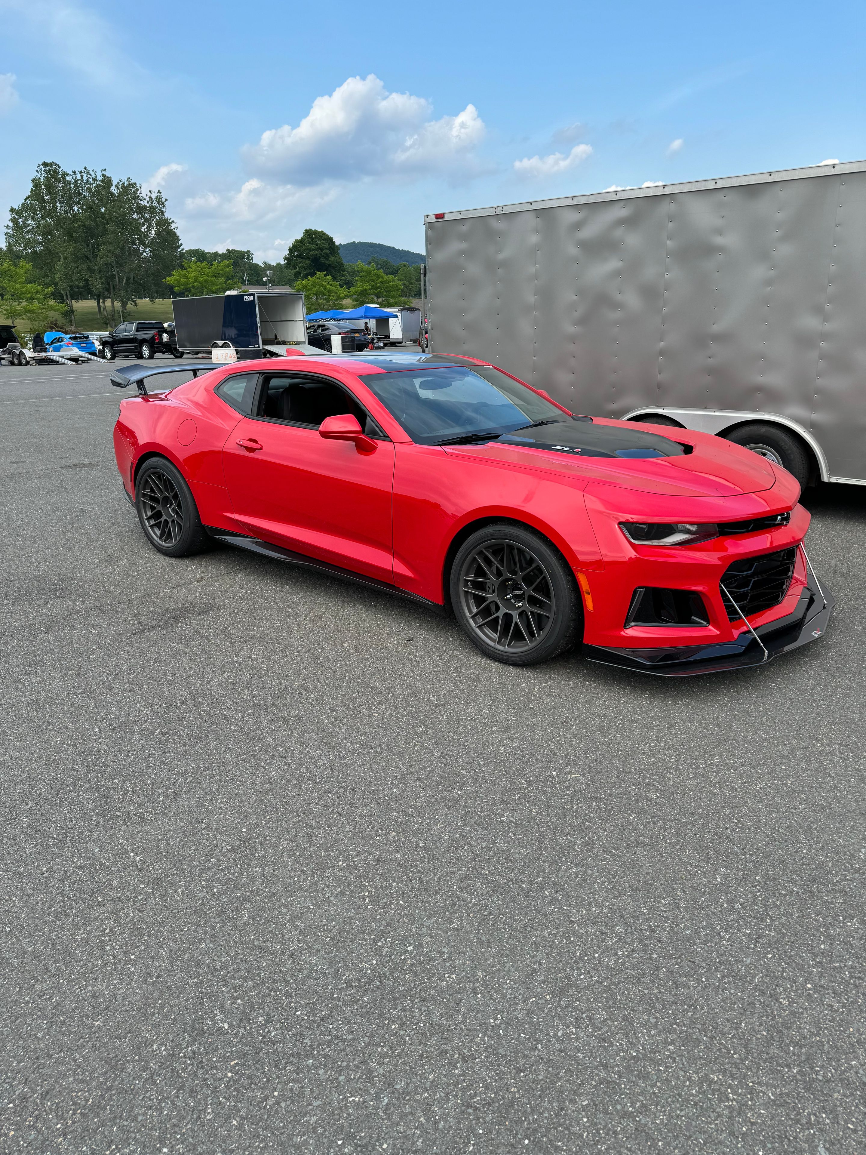 Red Chevrolet 6th Gen Camaro ZL1 1LE with 19" ARC-8 Apex wheels in Anthracite