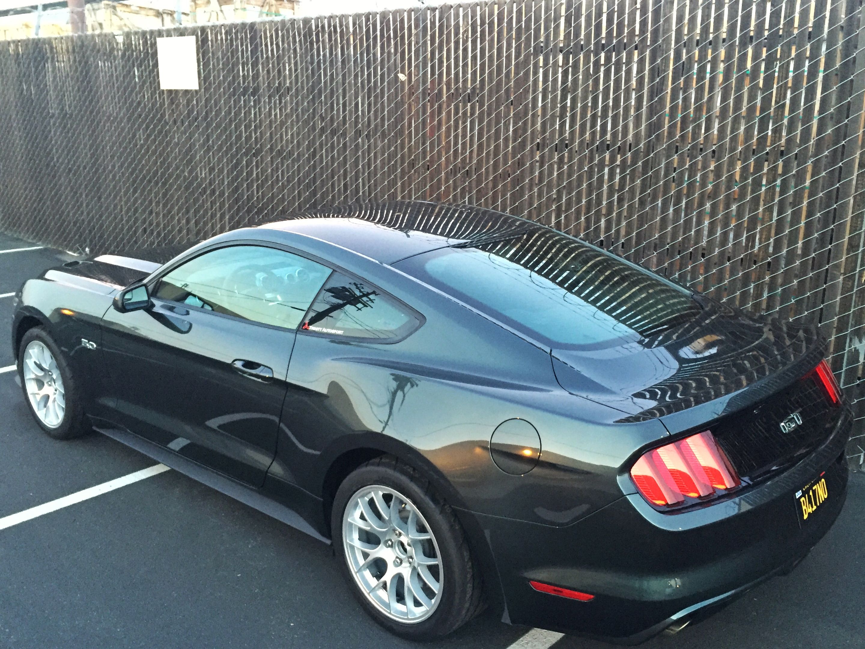 Green Ford S550 Mustang GT with 18" EC-7 Apex wheels in Race Silver